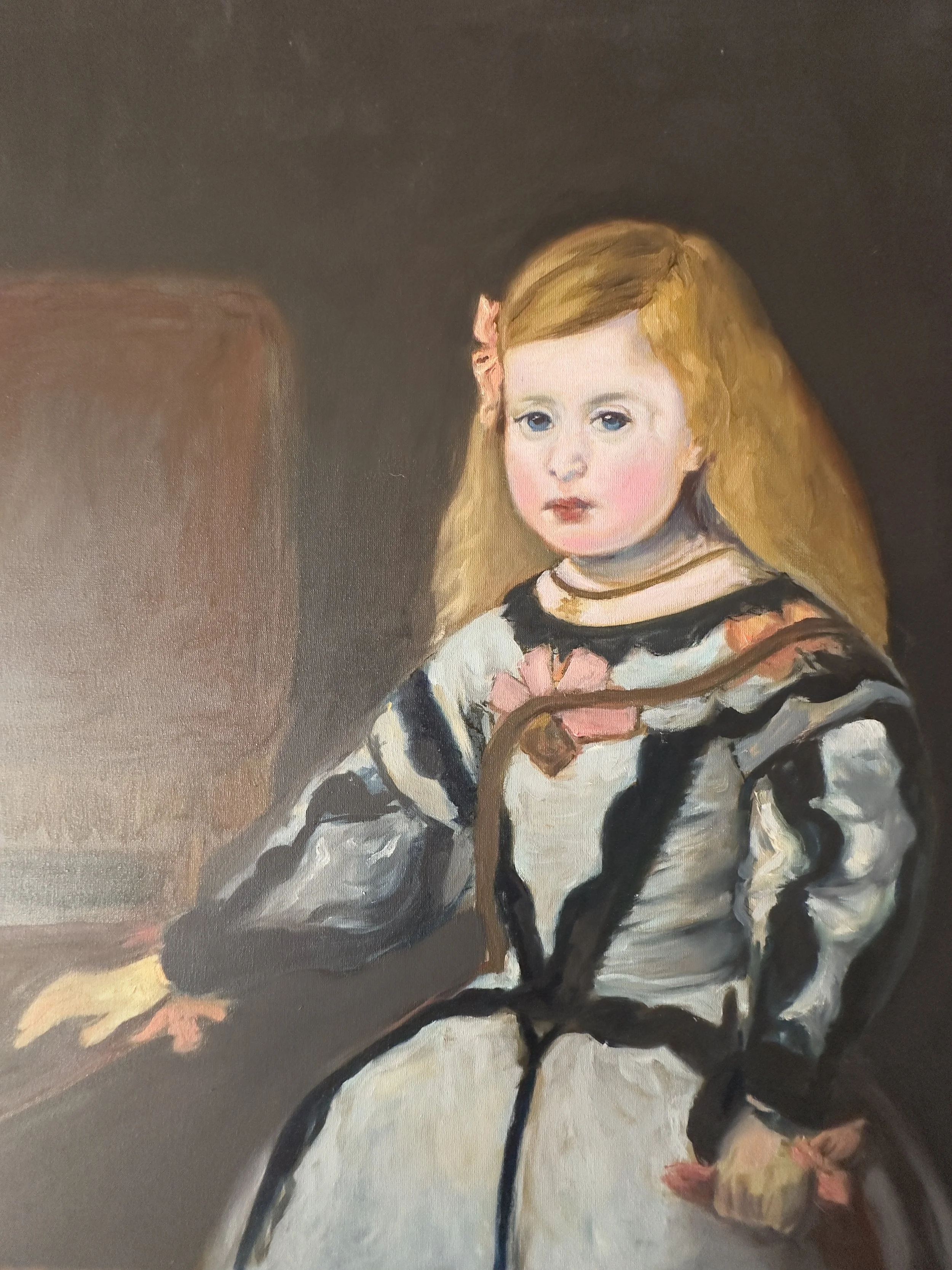 A portrait painting of a young girl with red hair, blue eyes, and pink cheeks. She wears a black and white striped dress with pink flowers and a pink bow in her hair, sitting against a dark background.