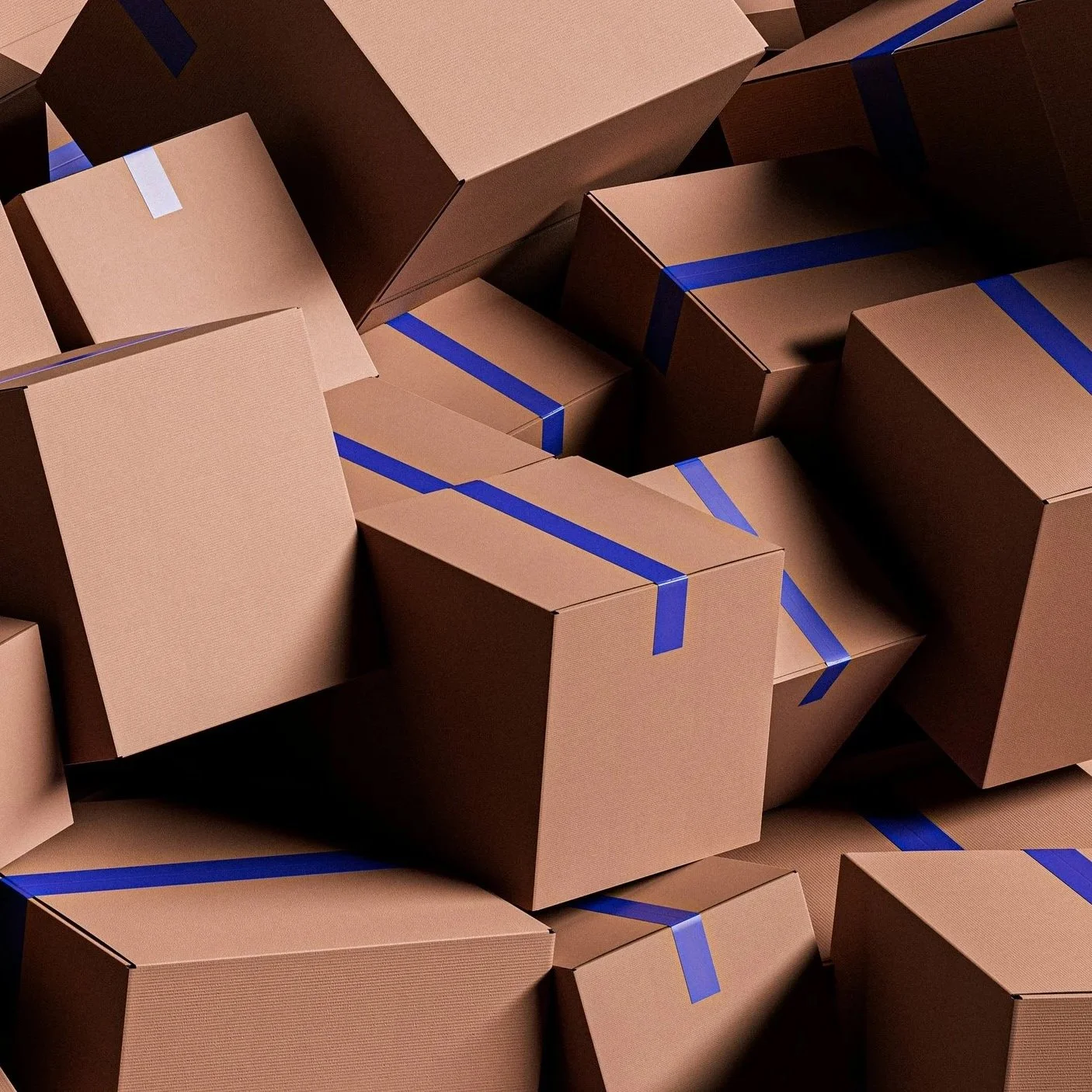 A collection of cardboard boxes demonstrating the space storing heavy glassware and candles can take vs saving space by renting candles from Colorado Candle Studio instead.