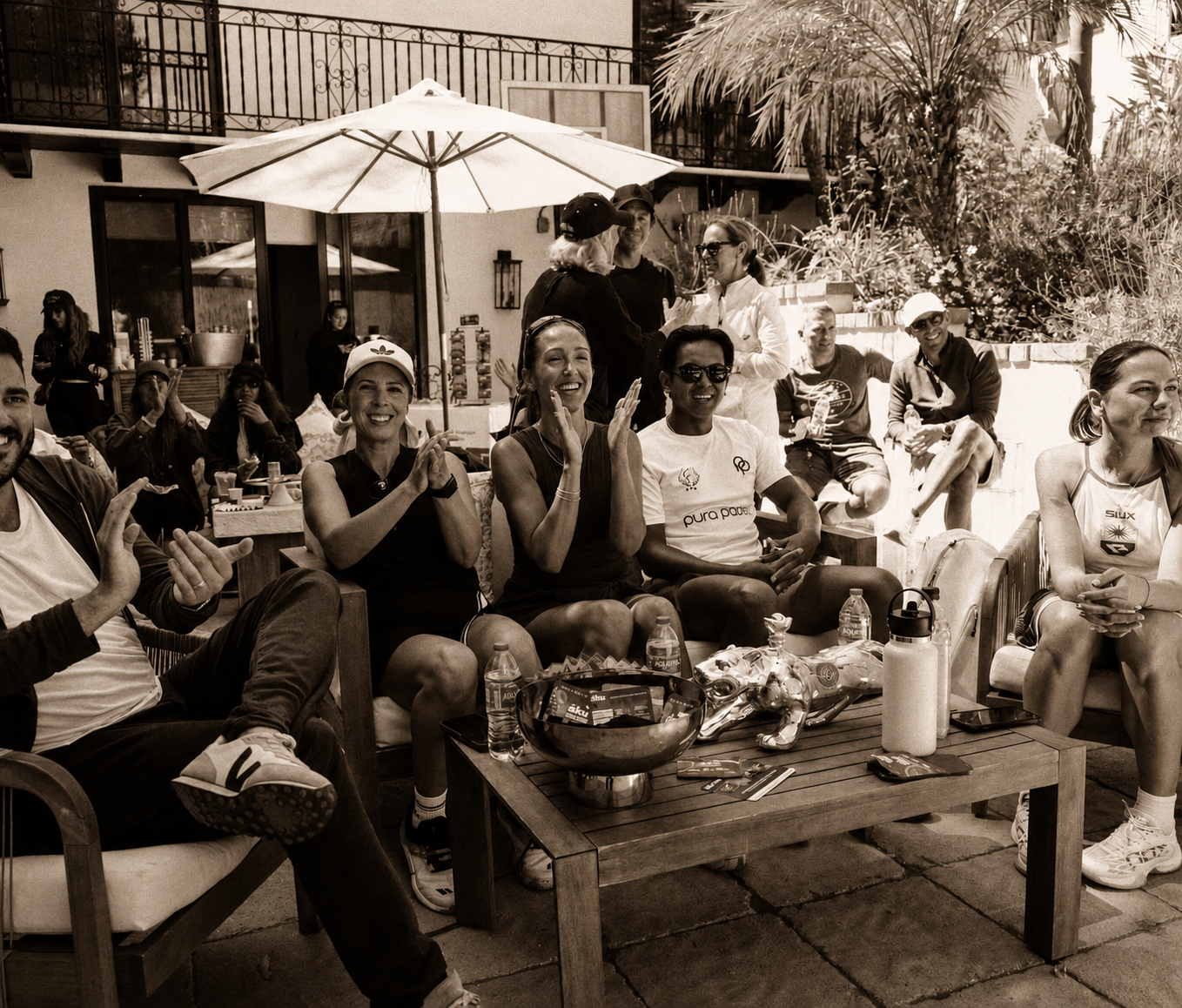 Wonderland Padel community members beside the court