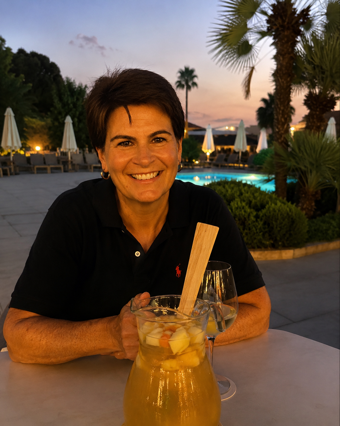 Natasha (Tash) Kyndt by the pool at Blau Hotel, Colonia Sant Jordi, Mallorca, at sunset.