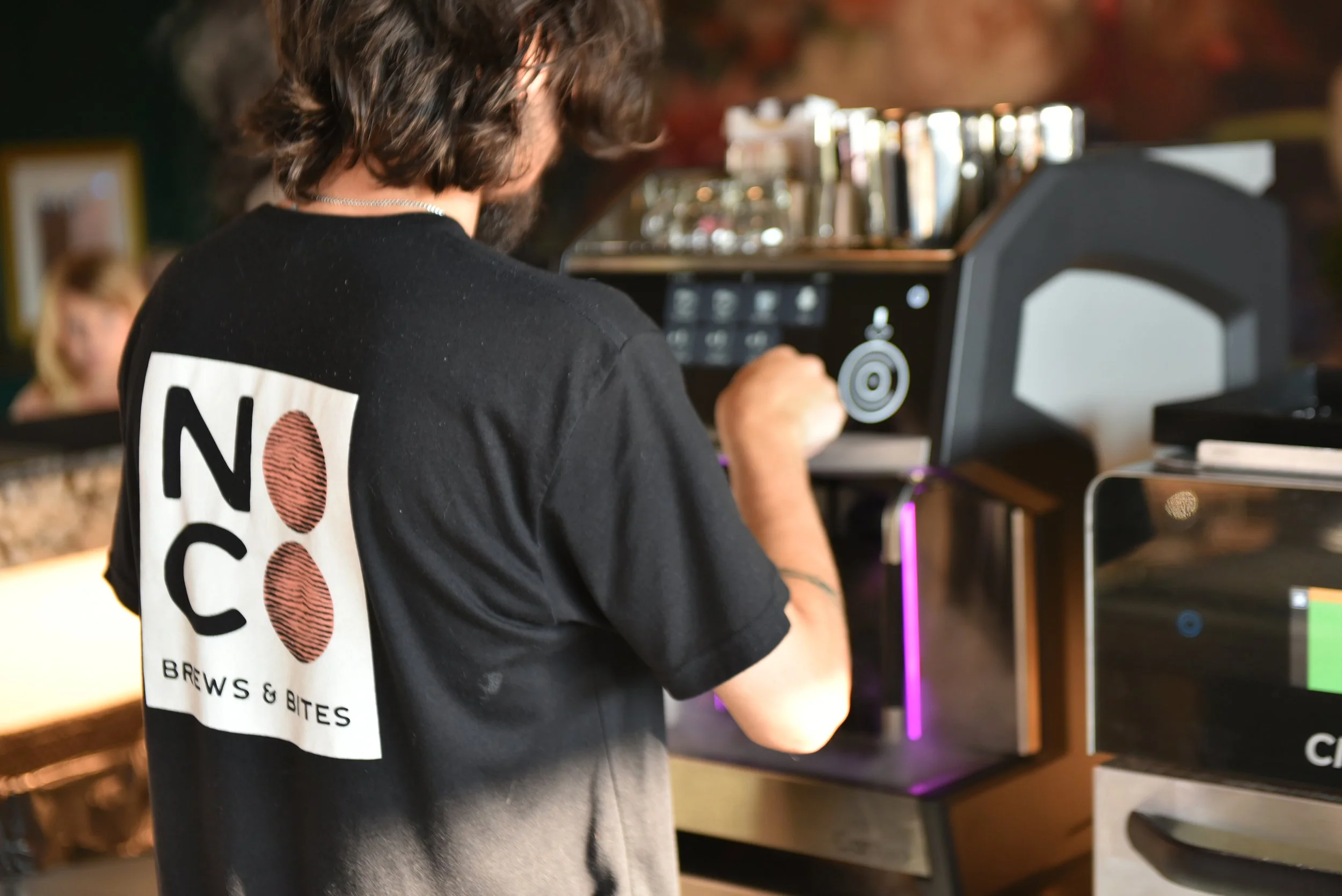 Coffee and seating at NOCO Brews & Bites in Raleigh
