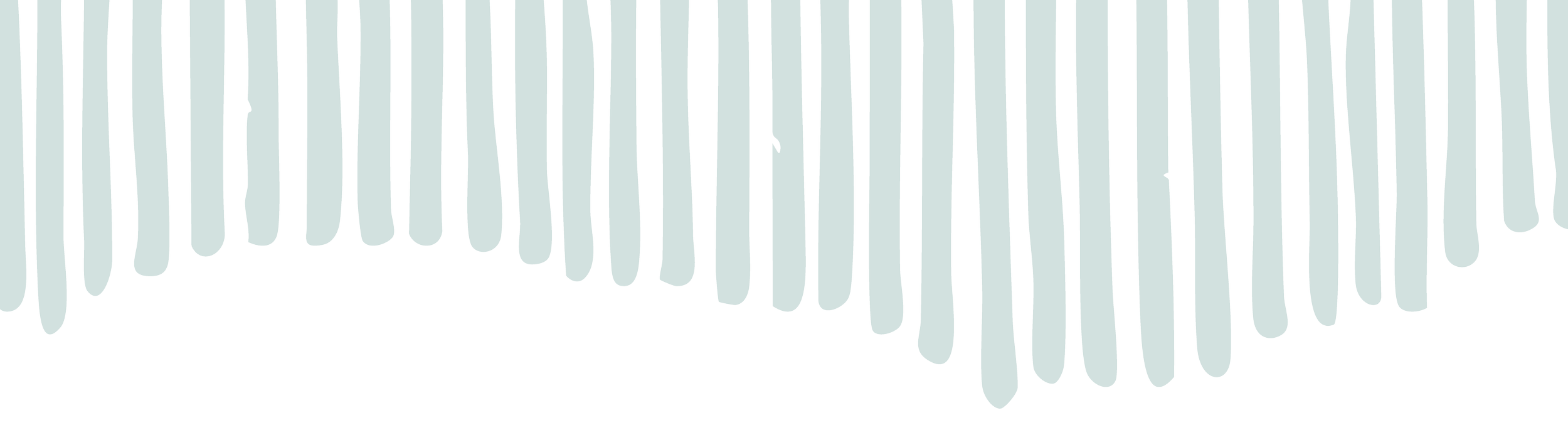 Close-up of a black and light gray striped comb with wide teeth.