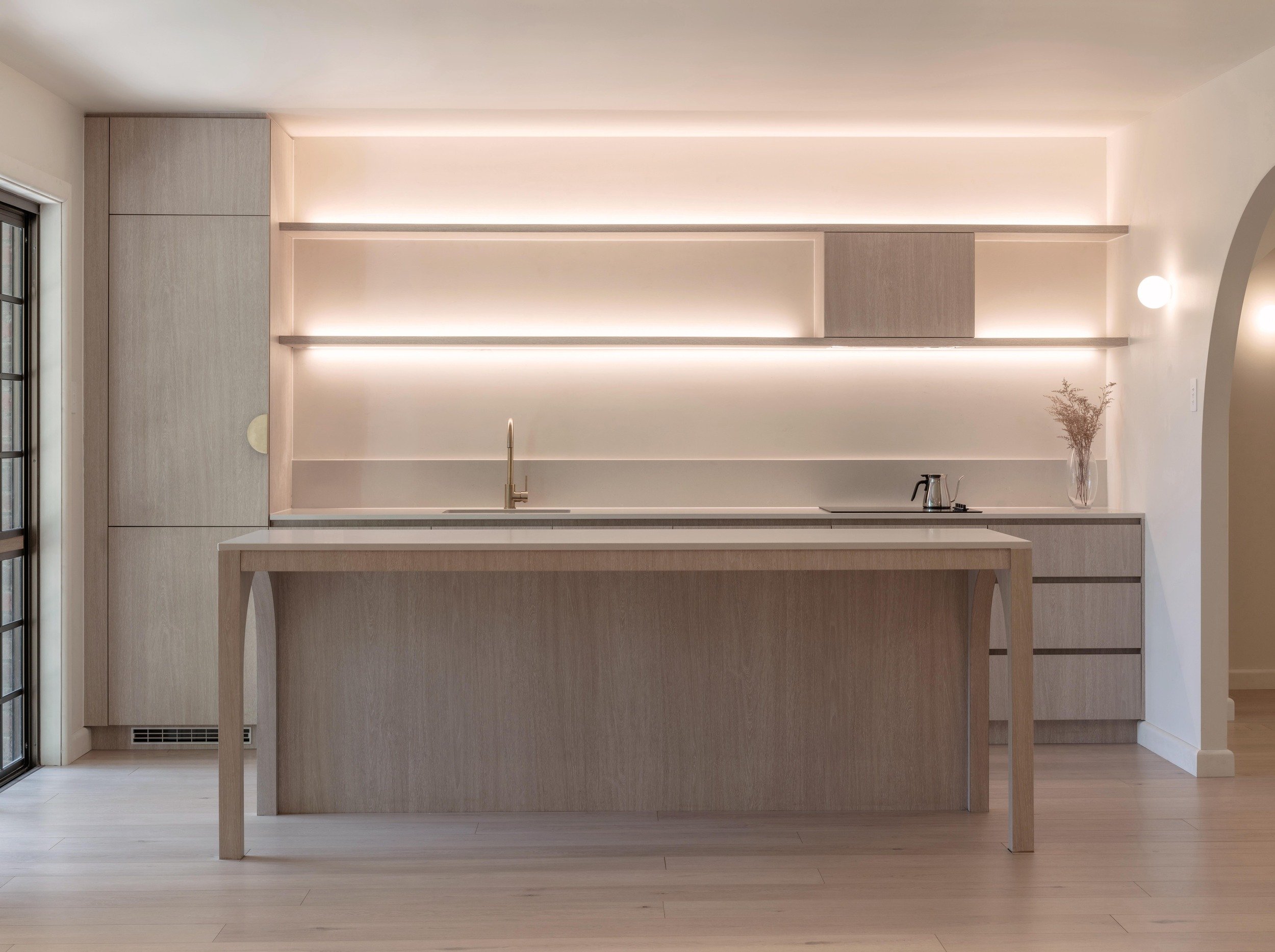 Springwood house kitchen with pale timber joinery and island bench