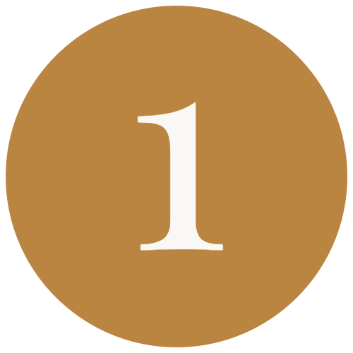 A circular badge with a gold background and a large white number 1 in the center.