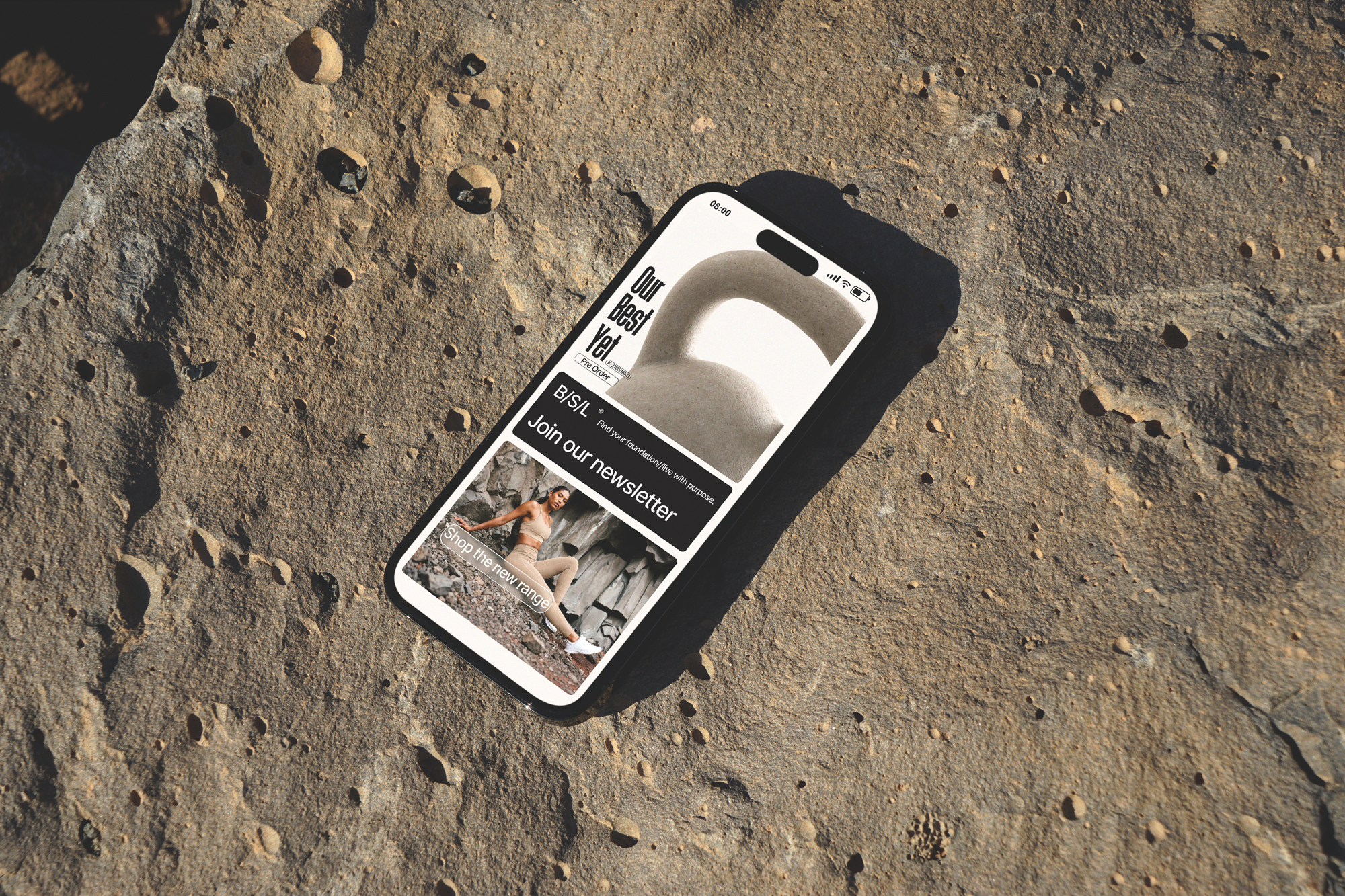 Free-iPhone-Pro-on-Rock-Mockupsmall.png