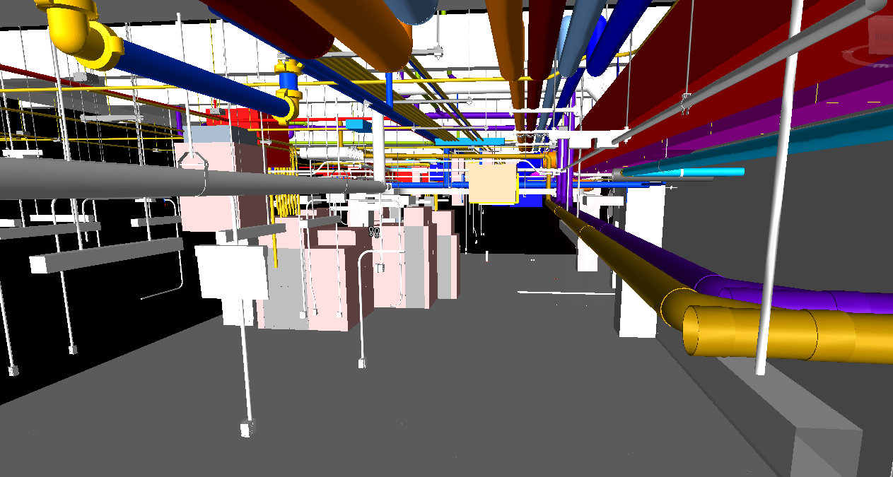 Colorful pipes and equipment in an industrial or mechanical room.