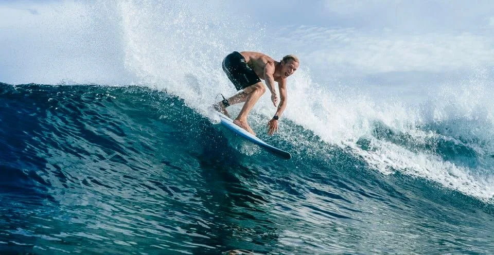 Surfer at a Telo Islands break