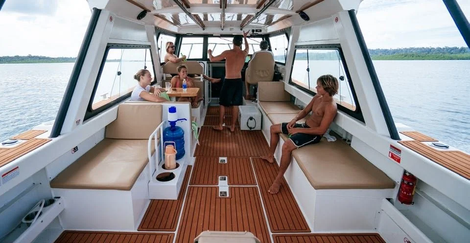 Guests aboard the Tanah Mympi vessel