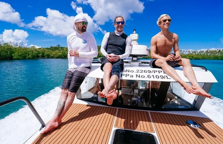 Guests aboard the Tanah Mympi speedboat