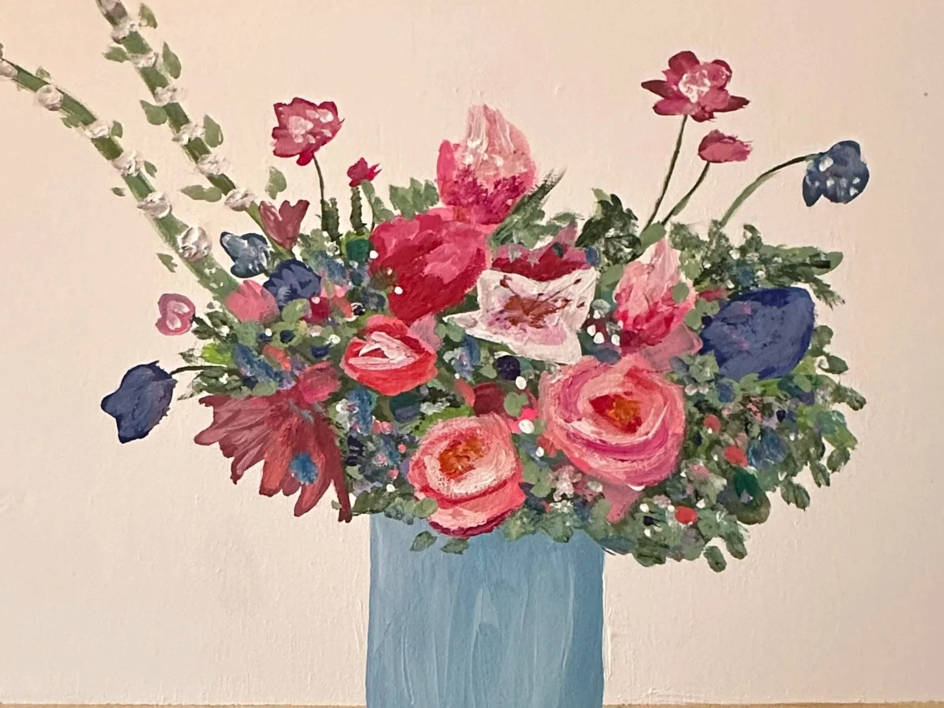 A painted still life of a bouquet of pink, red, and blue flowers in a blue vase on a light-colored surface with a plain background.