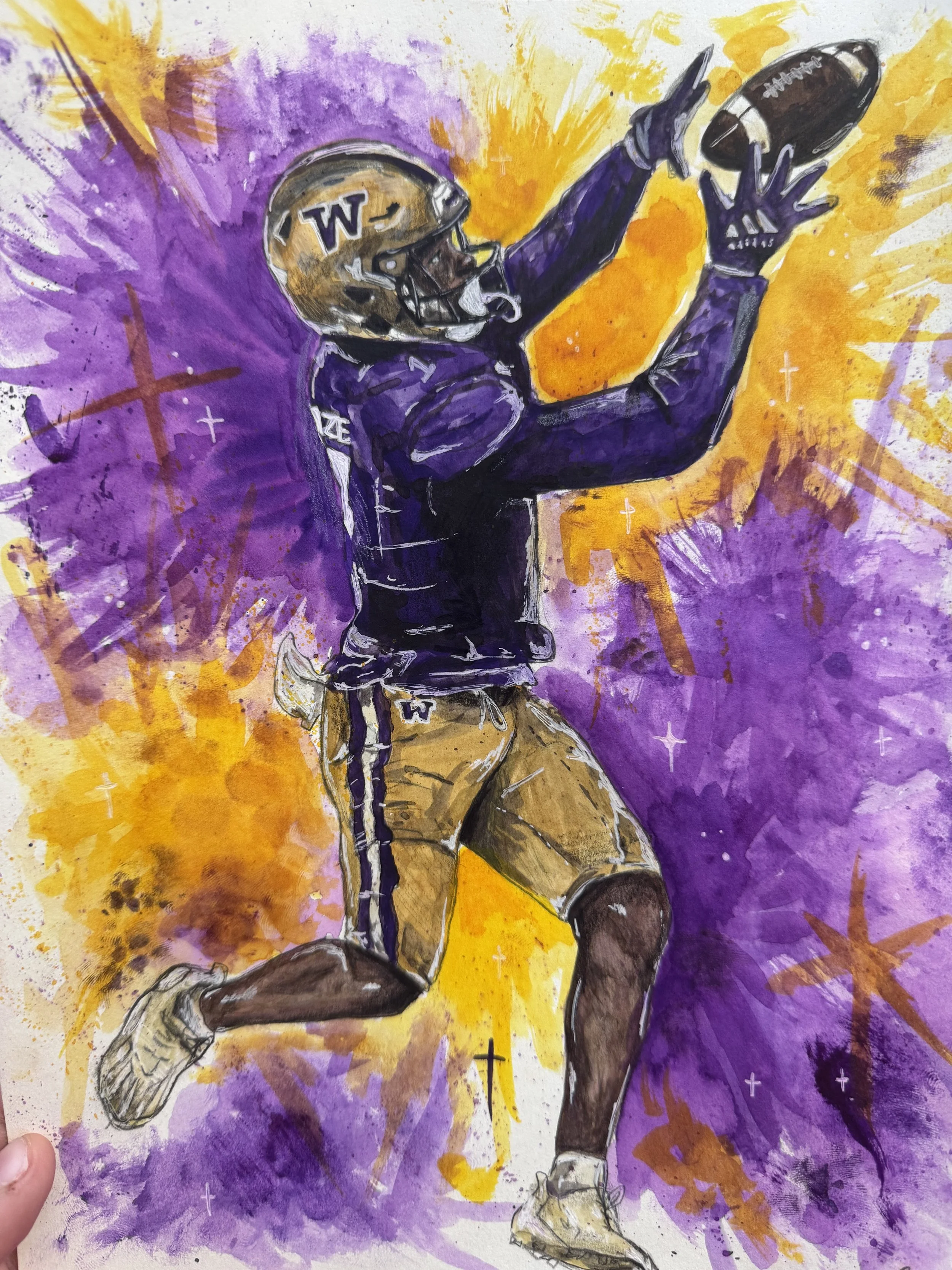 A vibrant watercolor painting of an American football player wearing a gold helmet with a 'W' logo, black face mask, purple jersey, khaki pants, and white cleats, in a dynamic pose reaching out to catch a football against a background of purple and y