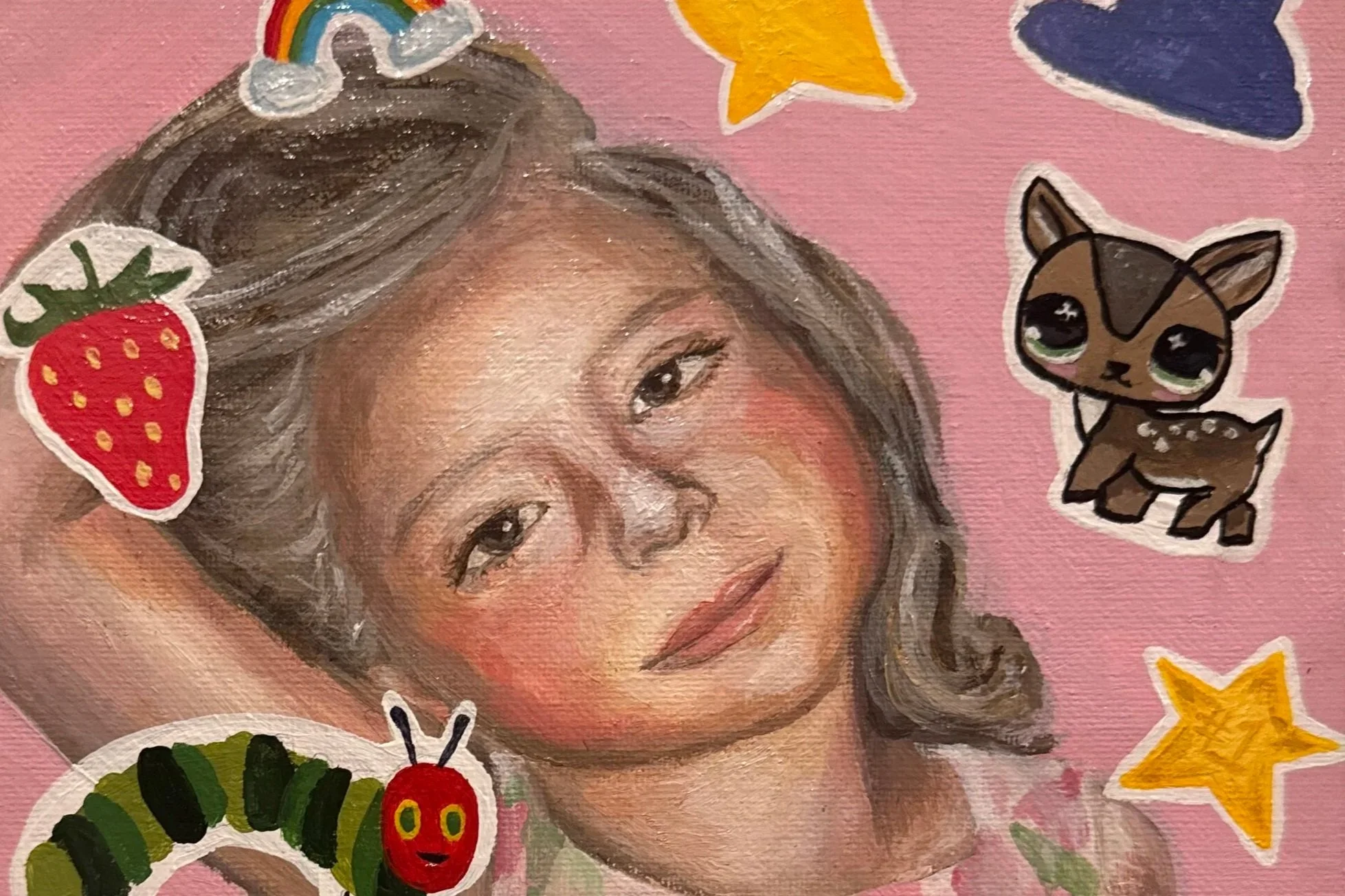 A painted portrait of a young woman with long, wavy hair, surrounded by stickers of a strawberry, a young deer, a caterpillar, and stars, on a pink background.