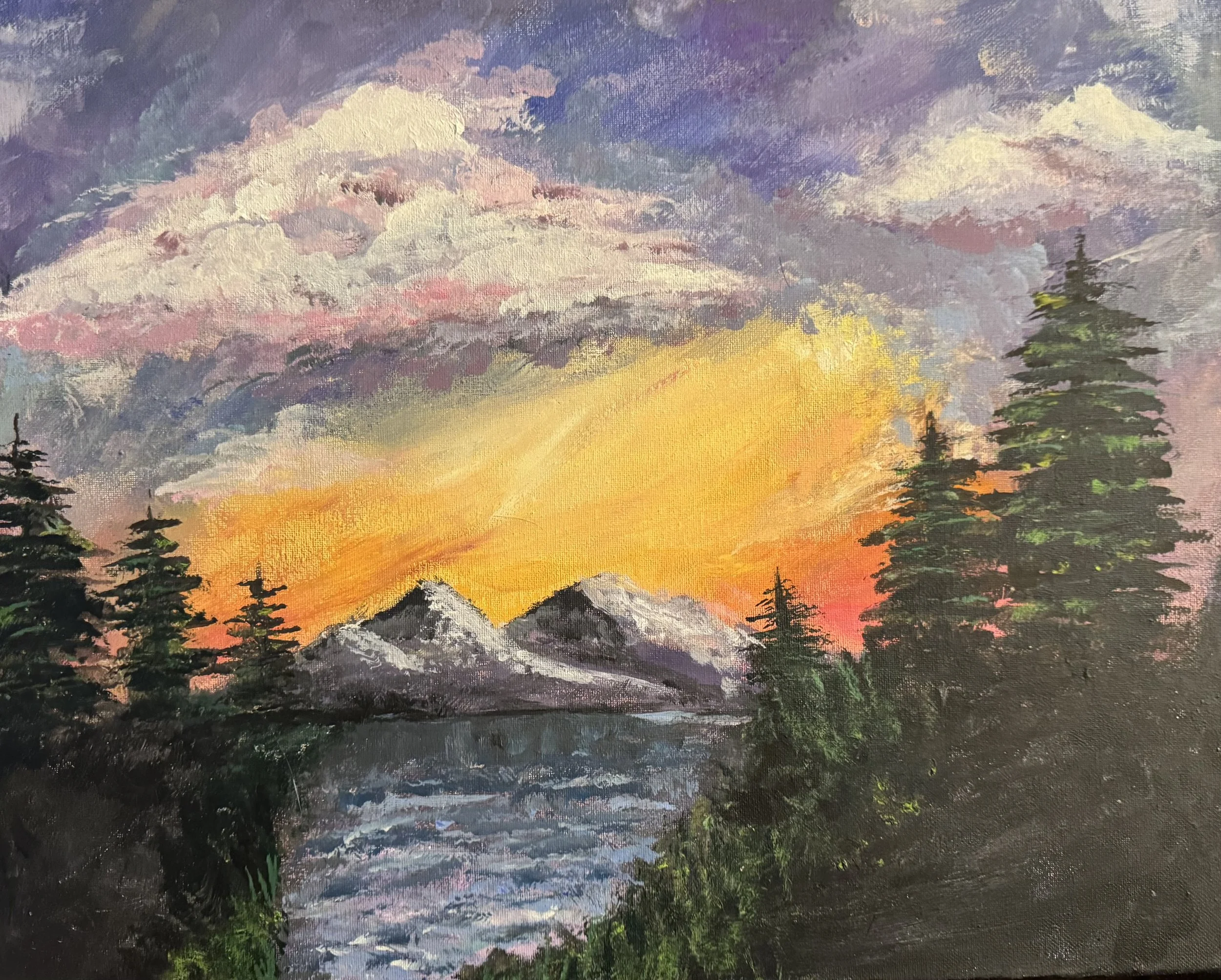 A landscape painting of a sunset over mountains and trees with colorful clouds in the sky.