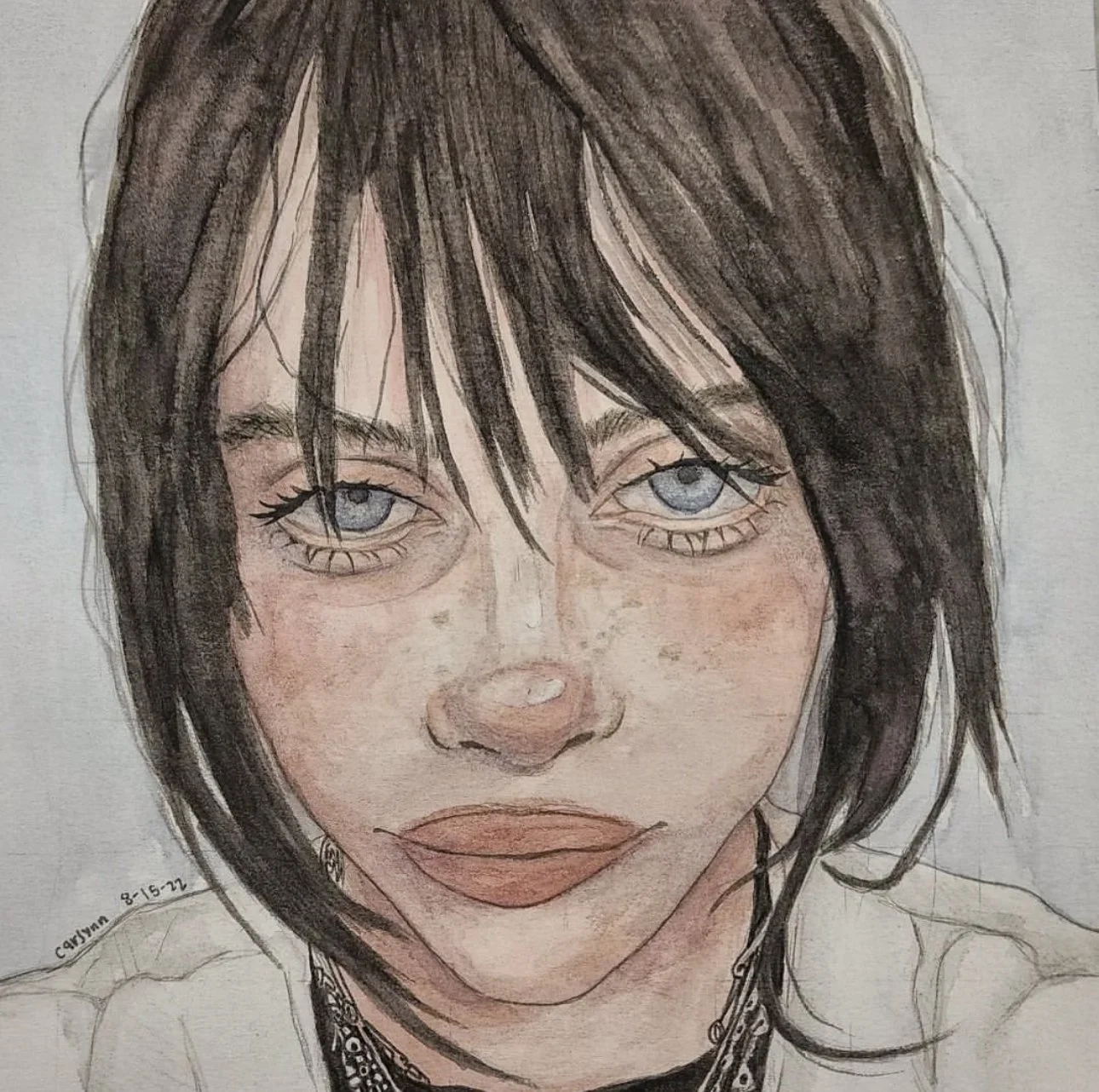A detailed colored pencil drawing of a young woman with dark hair and blue eyes, wearing a choker necklace and a white top.