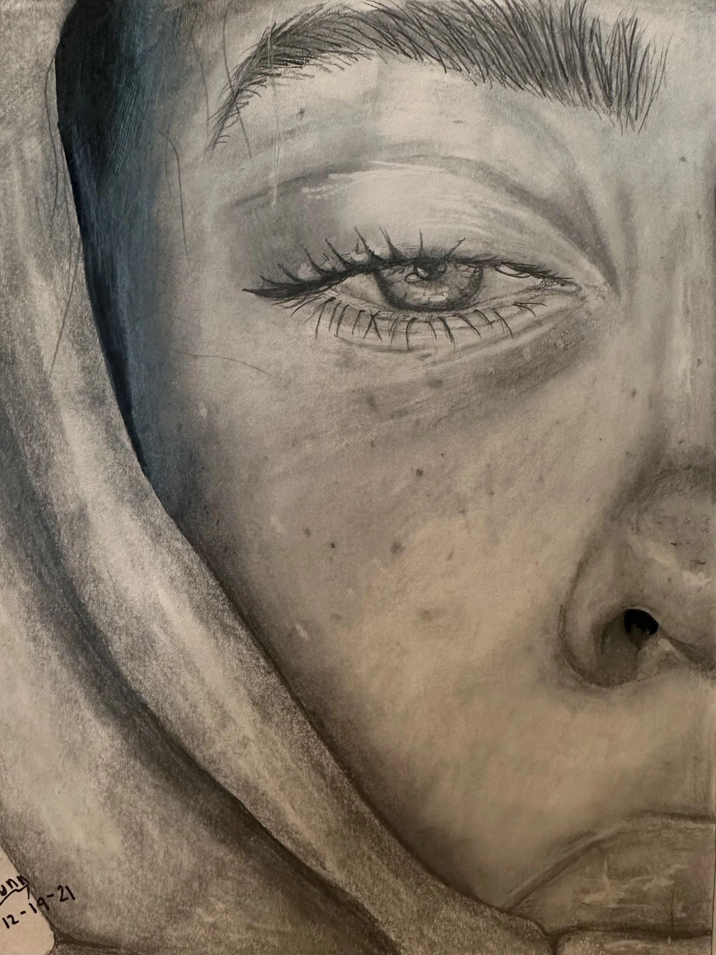 Close-up pencil sketch of a person's eye, eyebrow, and part of the nose and cheek.