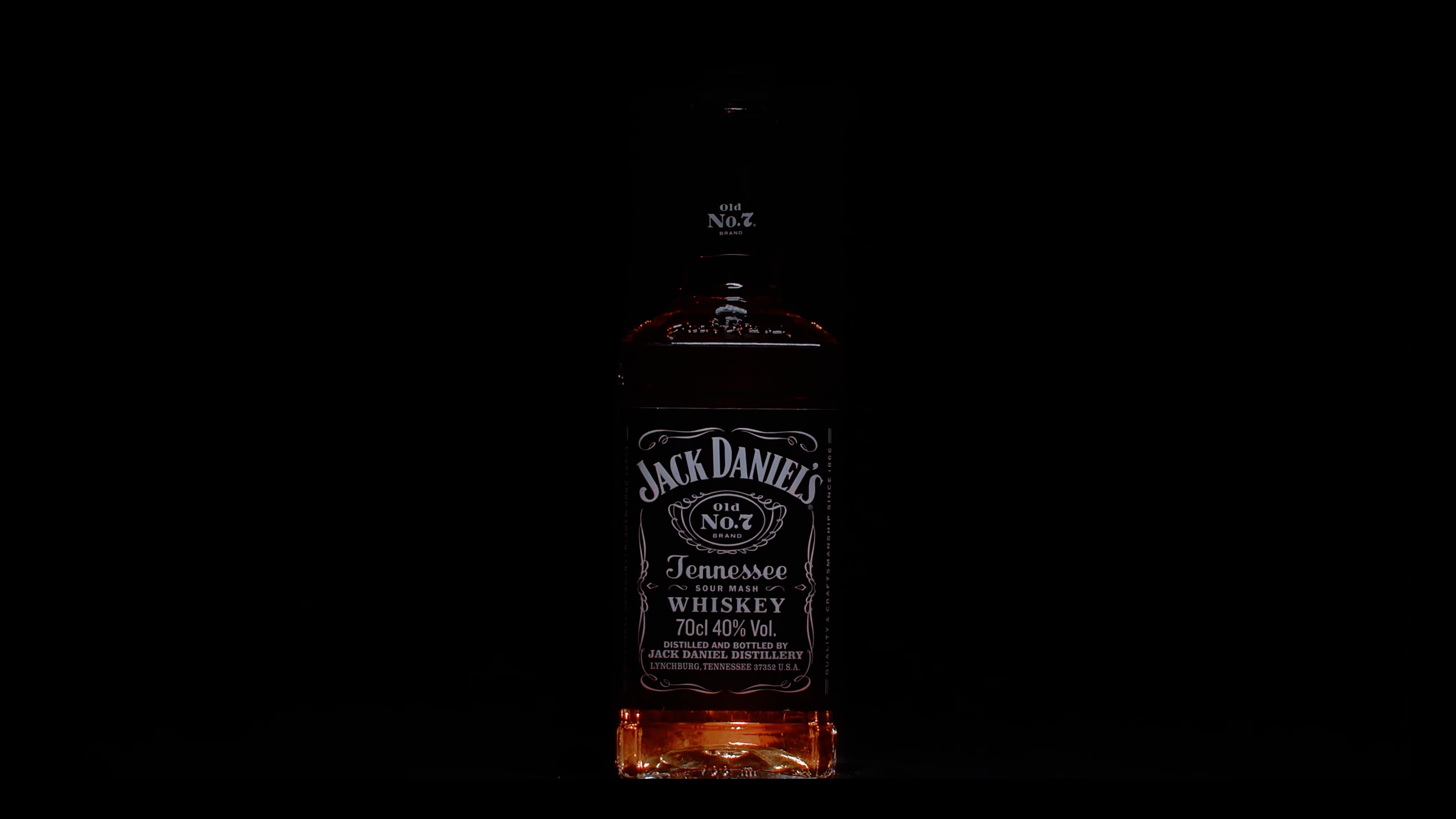 Jack Daniel’s bottle lit against a dark background for Farsight’s independent spec film.
