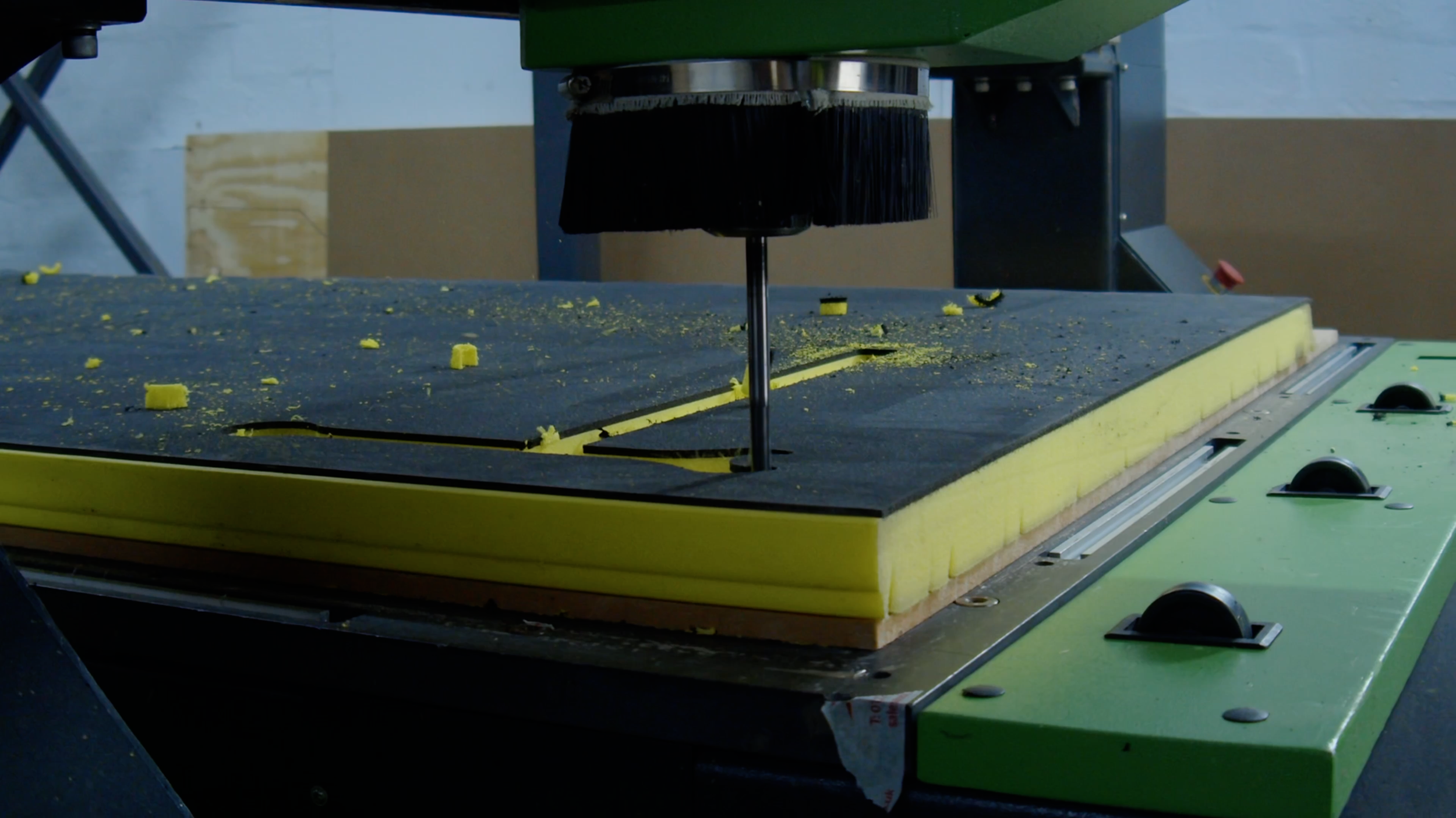 CNC machine cutting protective foam at Aberdeen Industrial Crating.