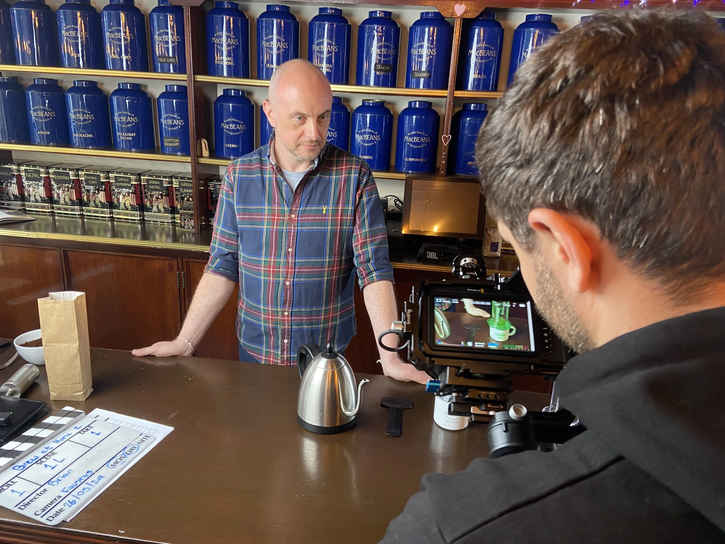 Farsight crew member filming Brian, owner of MacBeans Coffee Roasters, for the Brew From Home series.