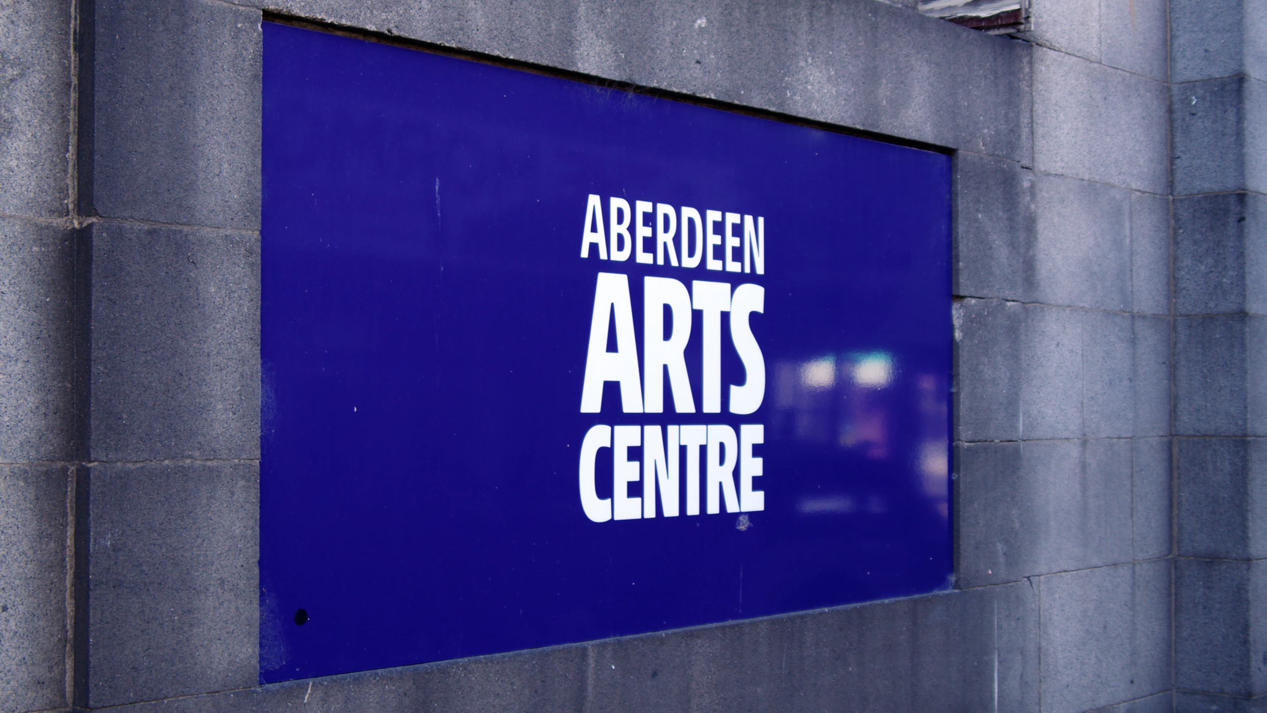 Aberdeen Arts Centre sign displayed on the exterior of the building.