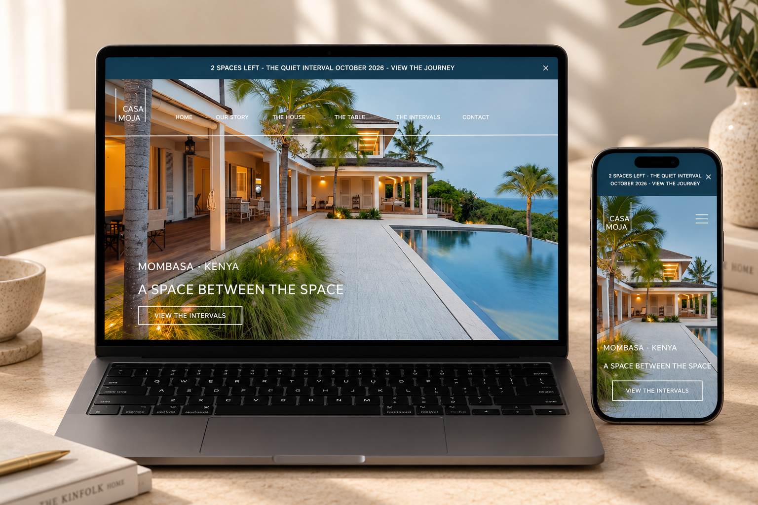 Website displayed on a laptop and a smartphone shows a luxury house with a swimming pool in Mombasa, Kenya, with tropical trees and a clear sky in the background.