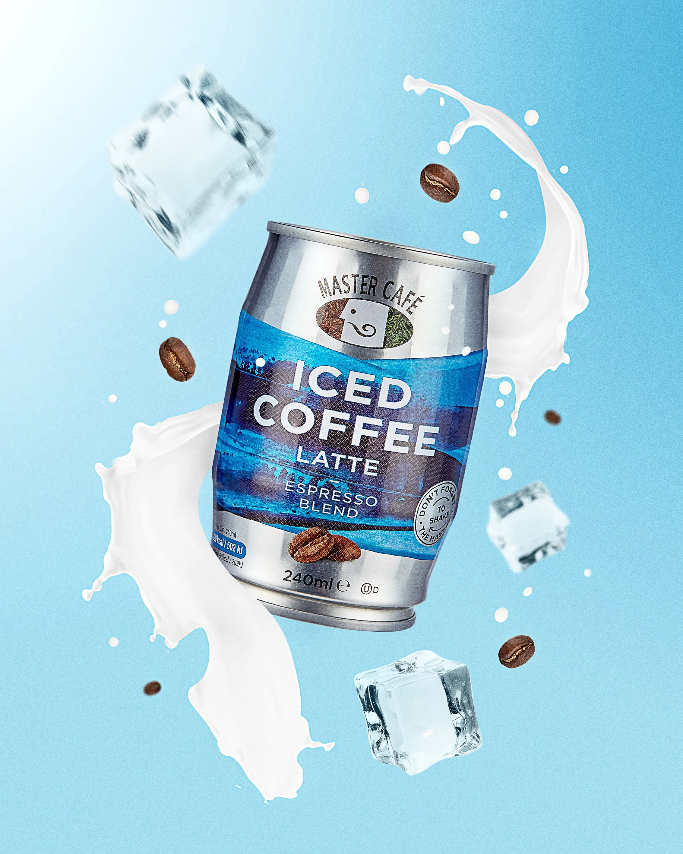 A can of Master Café iced coffee latte surrounded by ice cubes, coffee beans, and splashes of milk against a light blue background.