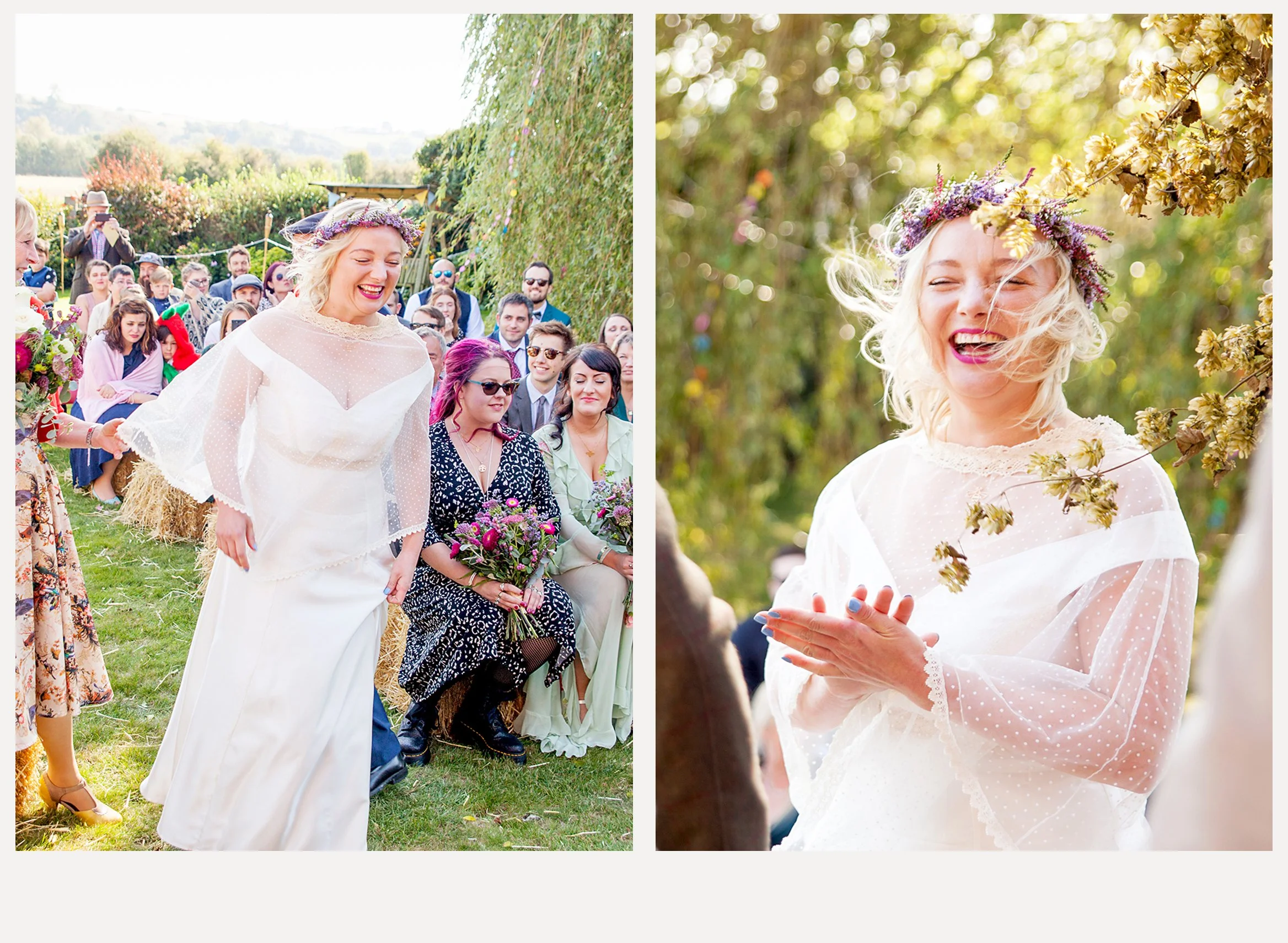 Two beautiful women with floral crowns smiling at an outdoor wedding ceremony. One woman with blond hair in white dress and the other with dark hair holding a bouquet, sitting on hay bales, surrounded by guests.