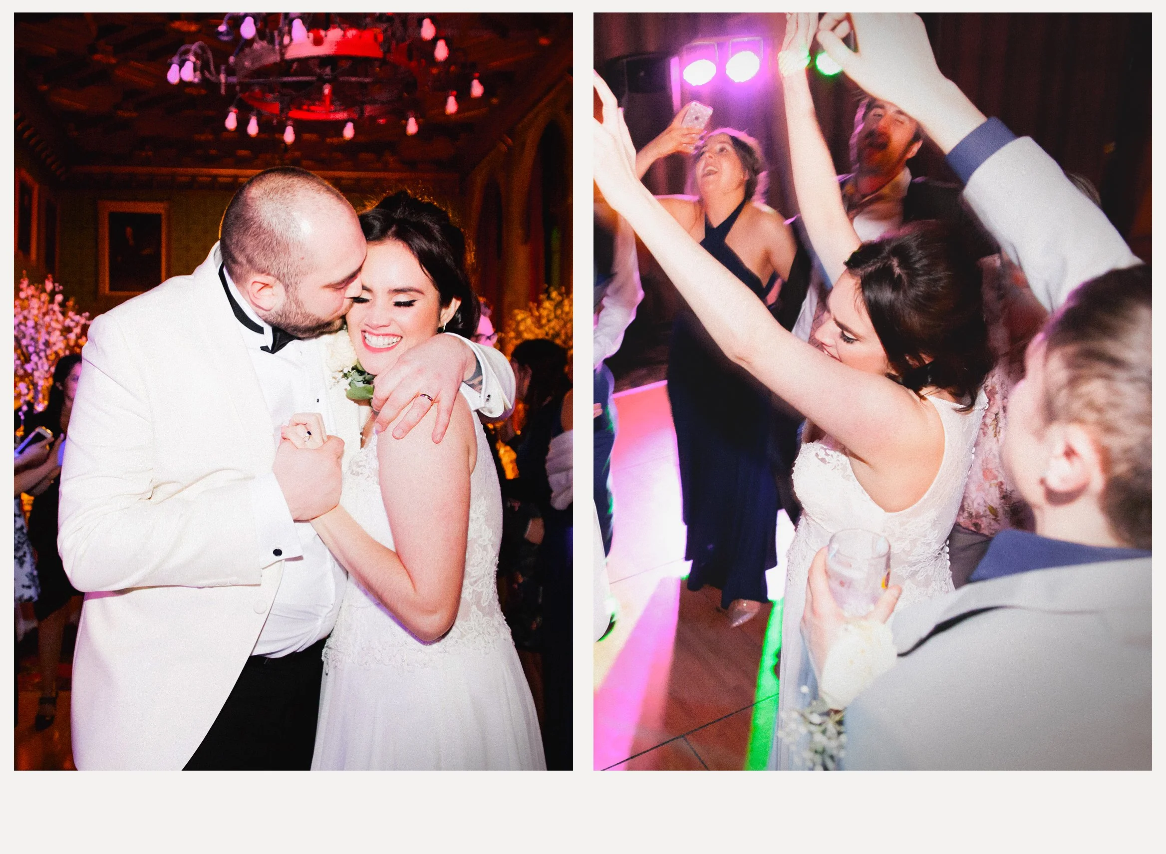 A bride and groom dancing and kissing at their wedding reception, surrounded by guests dancing and celebrating in a decorated indoor venue with chandeliers and warm lighting.