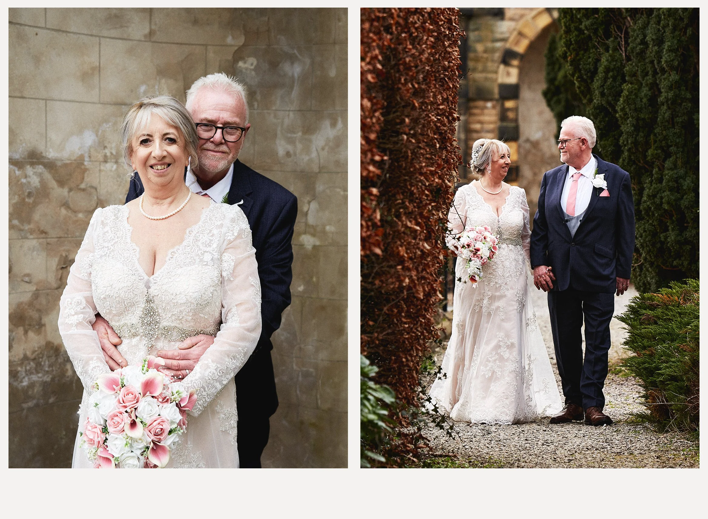 A wedding couple, an elderly woman and man, dressed in wedding attire. The woman wears a white lace dress and holding a bouquet of pink and white roses. The man wears a navy blue suit with a pink tie and white boutonniere. They are outdoors, surround