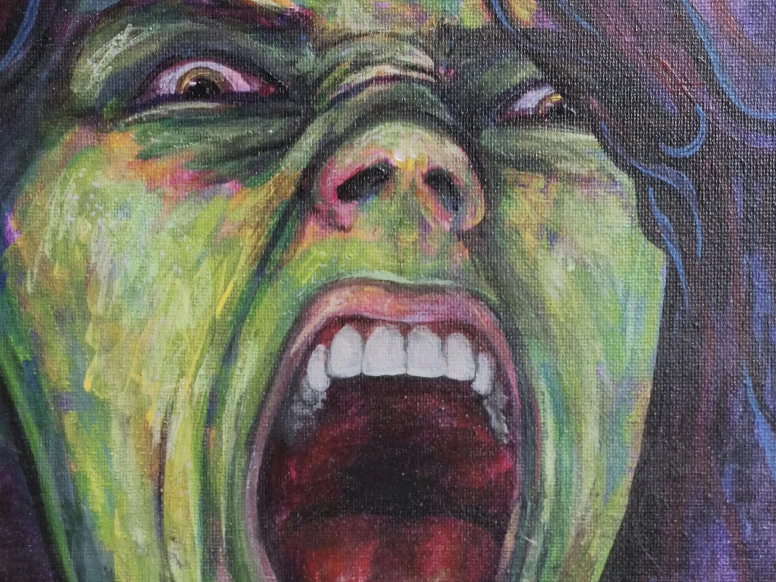 Close-up of a colorful painted portrait of a person with their mouth open, showing teeth, and a distressed expression.