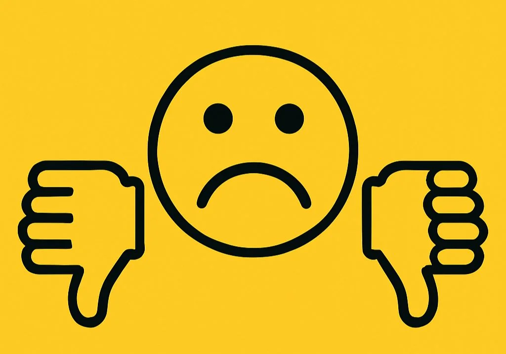 Yellow sad face with two thumbs down.