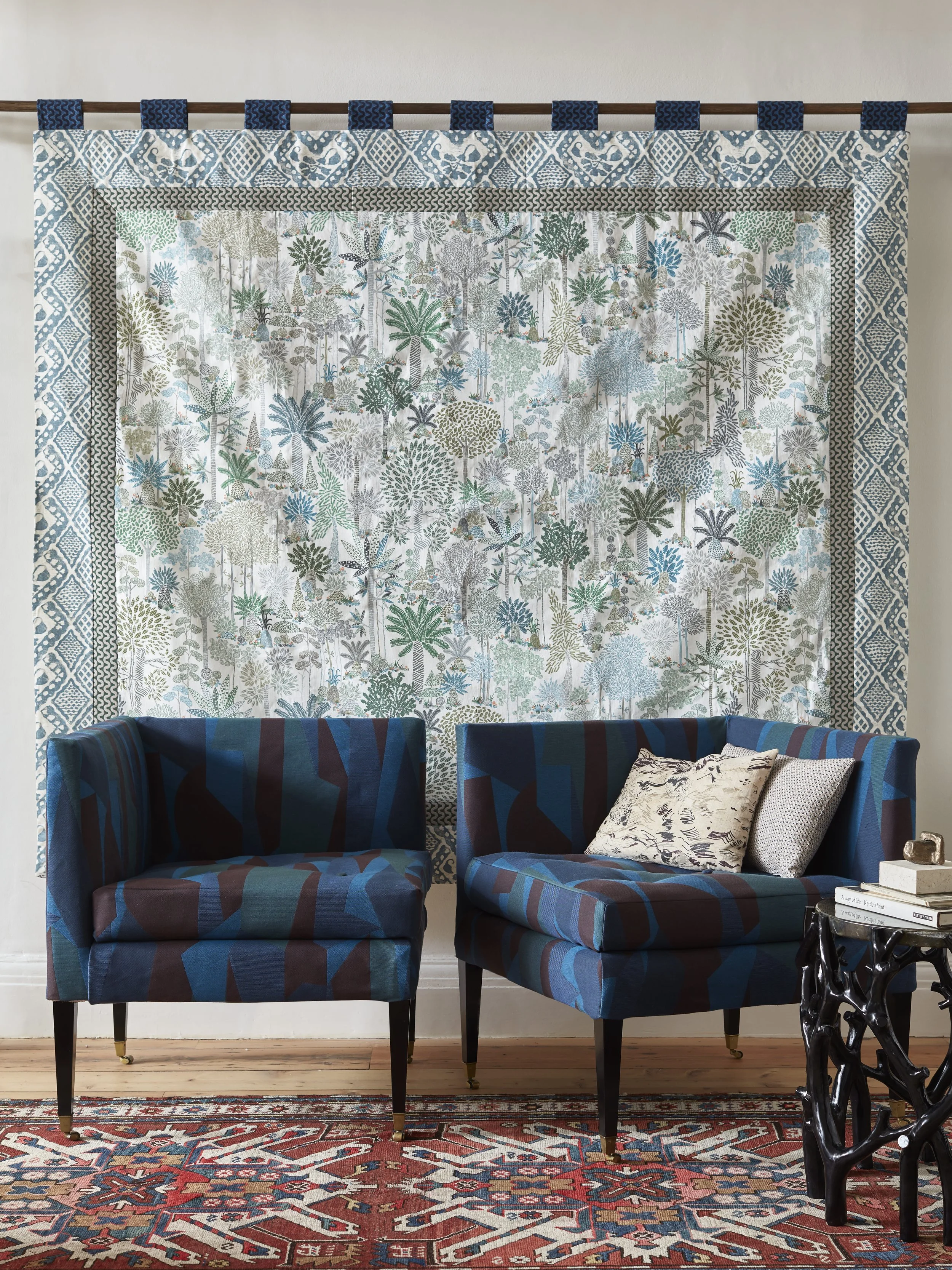 Irish Sofa in Two Parts upholstered in Reeds Woven. Backdrop is Clea printed linen in Jungle