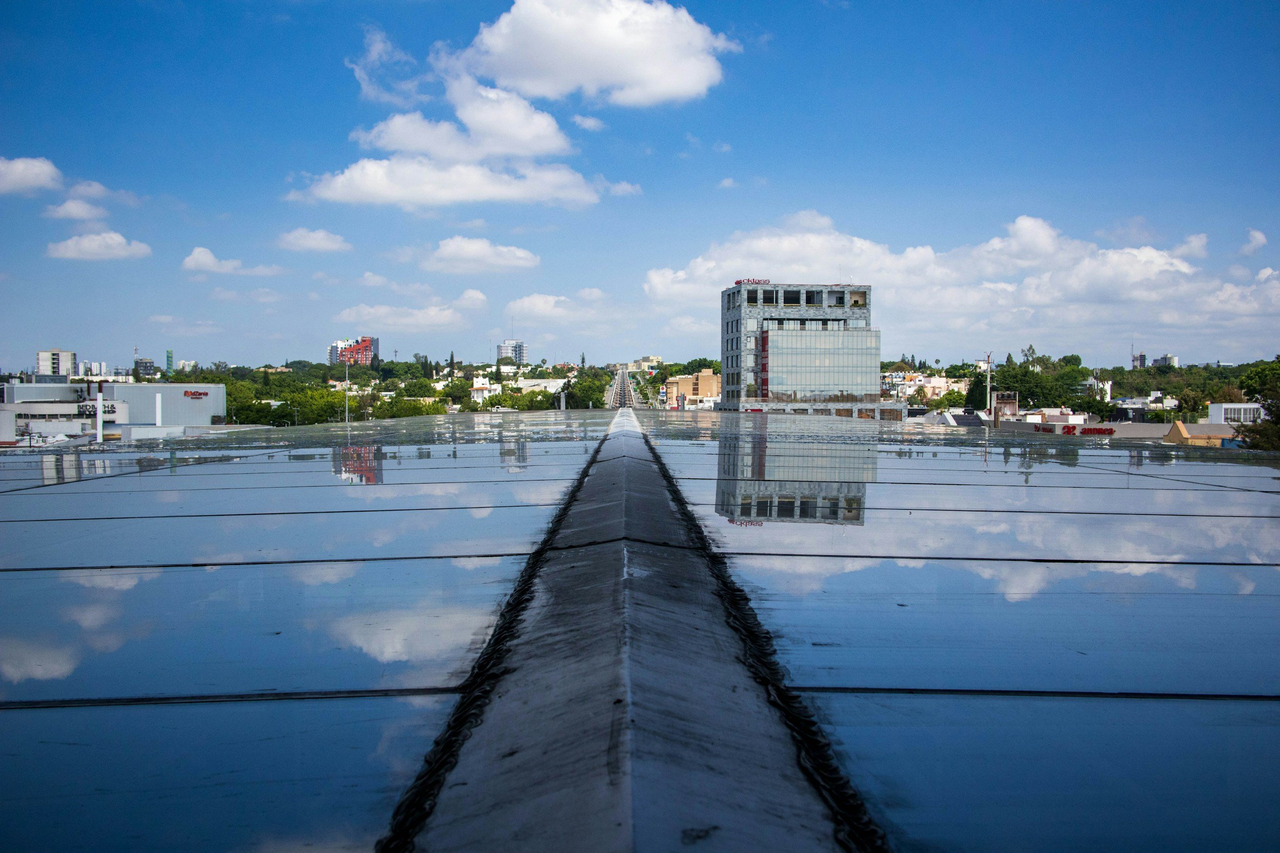 Reflective commercial flat roof coating system