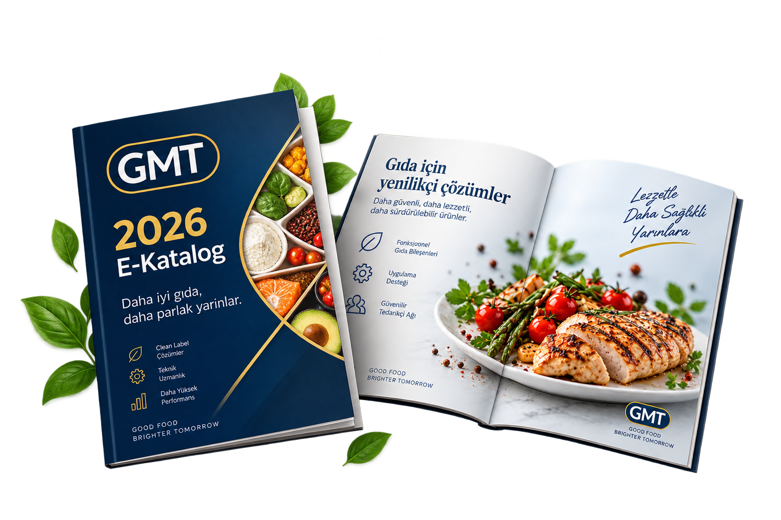GMT 2026 E-Katalog, sağda yemek ve salata ile açık olan bir kitap. Kitapta gıda çözümleri ve sağlıklı beslenmeye vurgu yapılıyor.