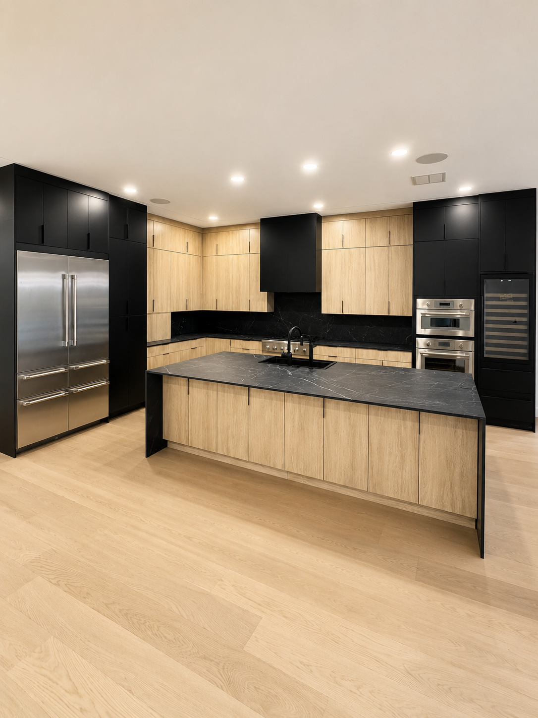Modern black and natural wood kitchen renovated by Soomro Real Estate