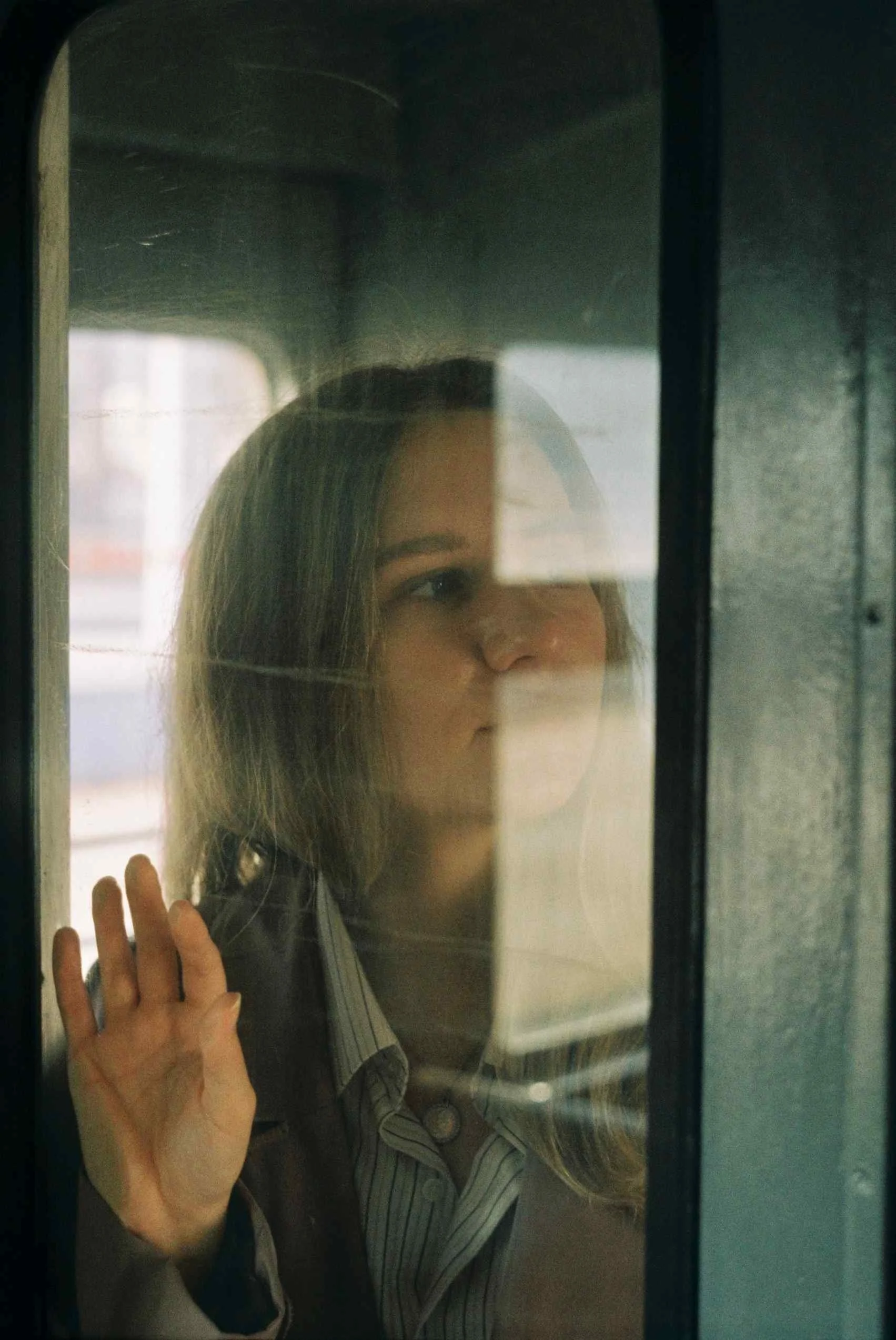 parsley-sword-woman-train-window-reflection.jpg