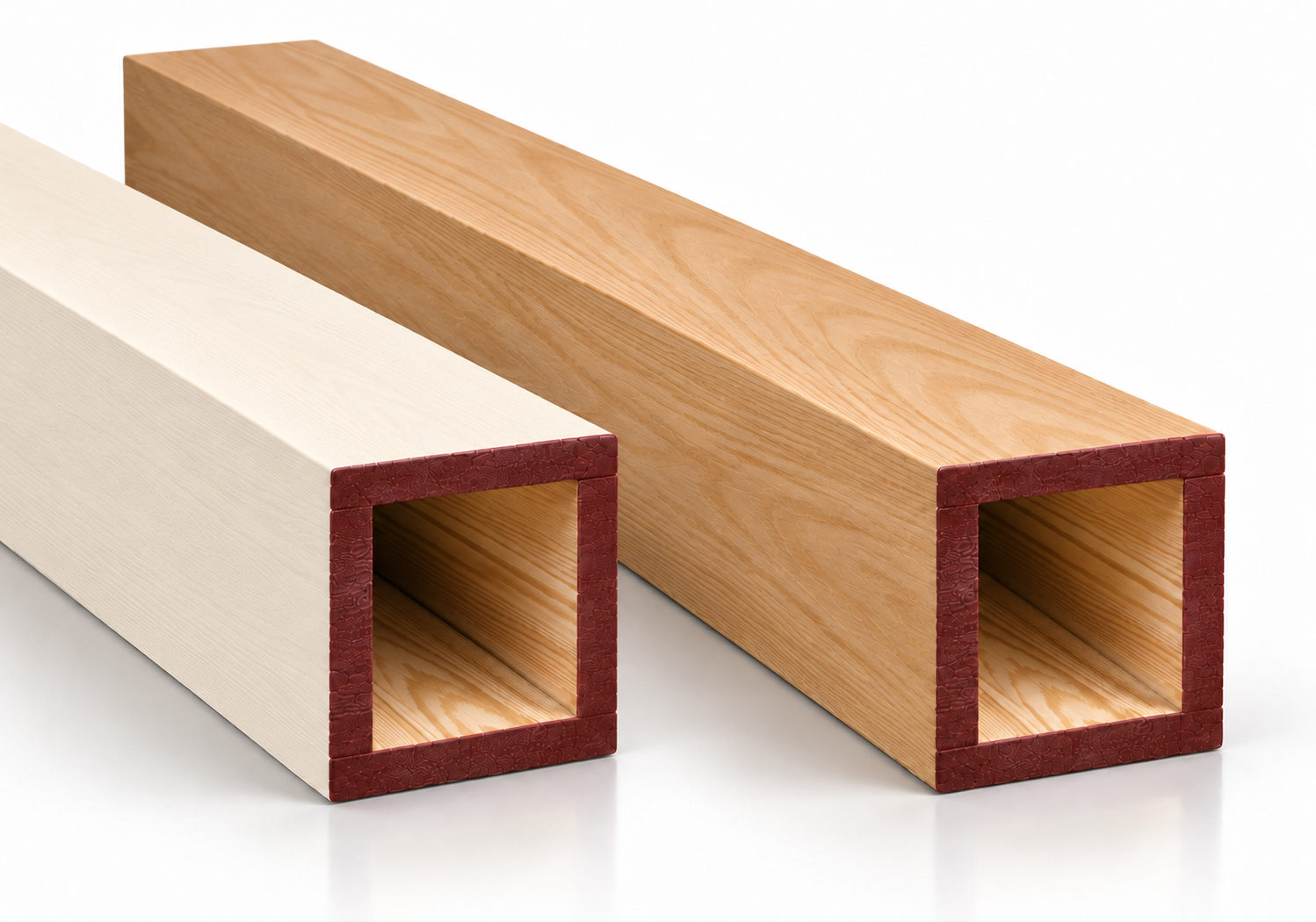 Two hollow rectangular wooden beams, one light-colored with a red textured edge and one natural wood-colored, placed on a white surface.