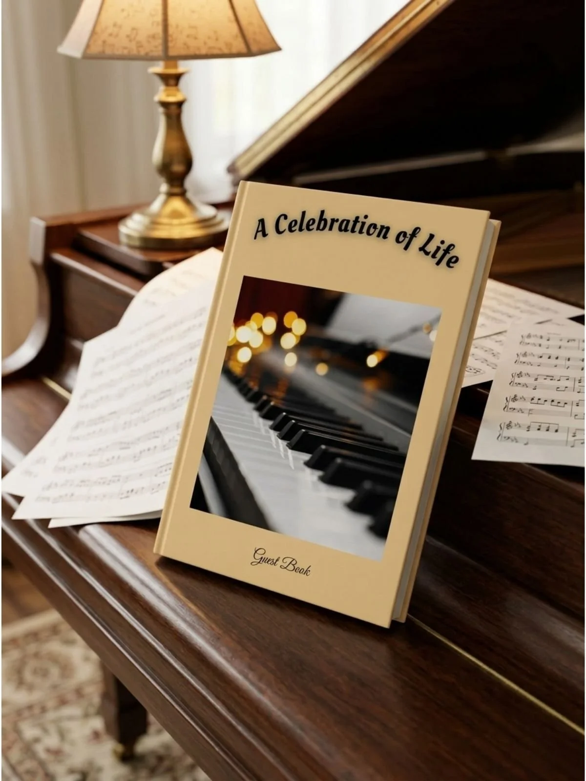A guest book titled 'A Celebration of Life' resting on a wooden piano with open sheet music, a table lamp, and a blurred background.