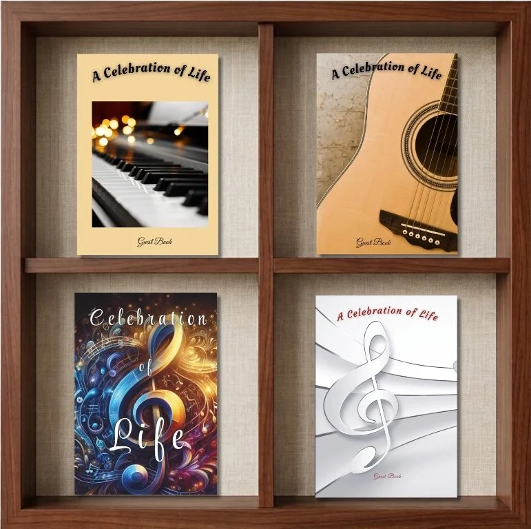 Four guest books titled 'A Celebration of Life,' with covers featuring a piano, an acoustic guitar, abstract musical notes and colorful design, and a silver treble clef.