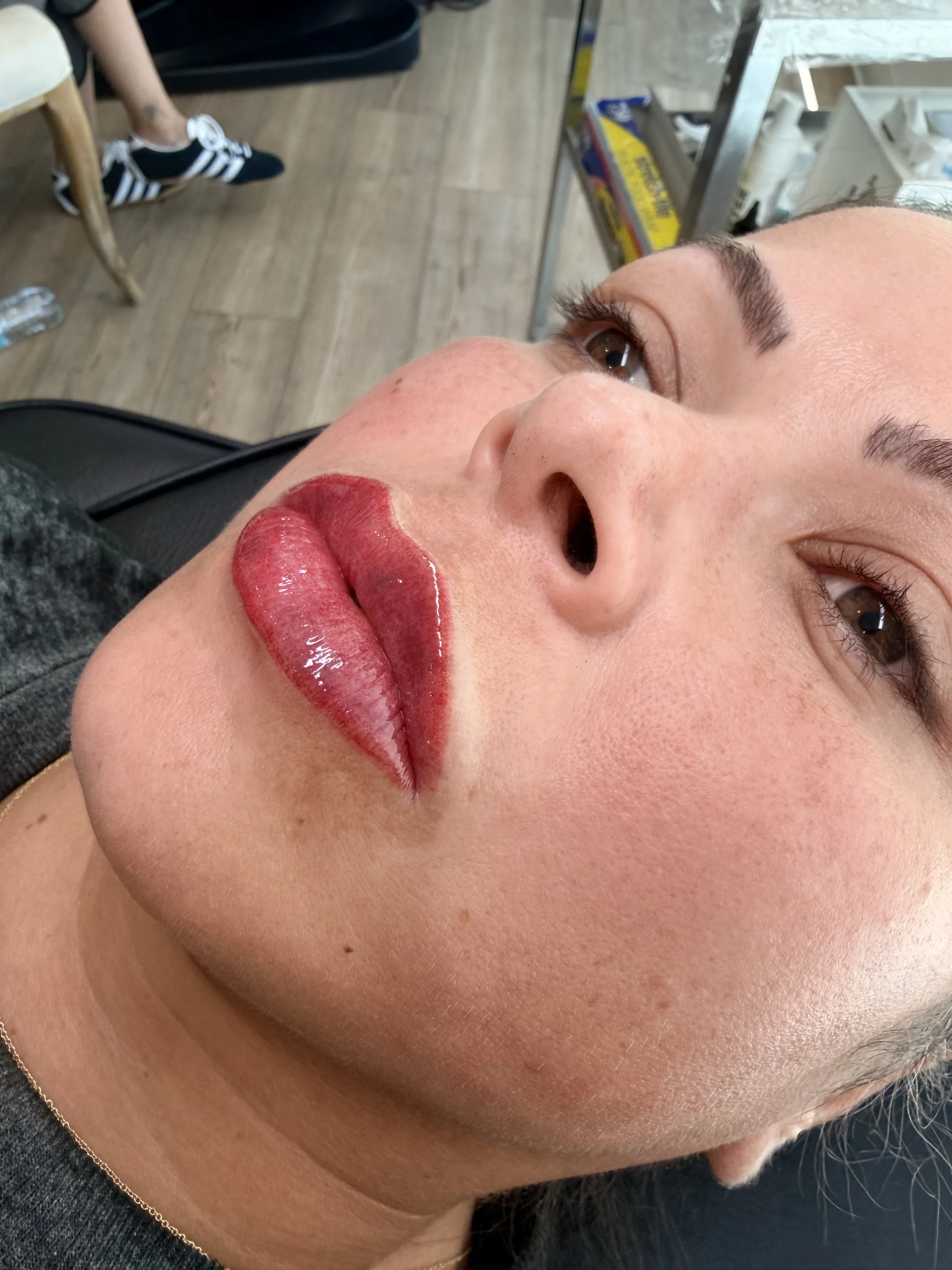 Close-up of client directly after lip blushing appointment.