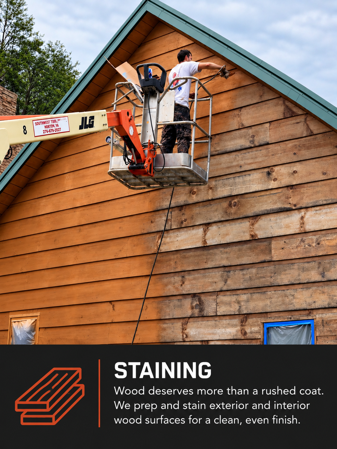 A man staining exterior house with wood siding by The Painters in Eastern Kentucky.