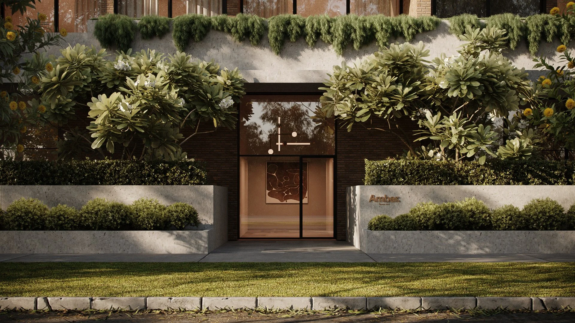 Front view of a modern building with lush greenery and large leafy plants in front, concrete planters, glass door, and a sign that reads 'Amber.'
