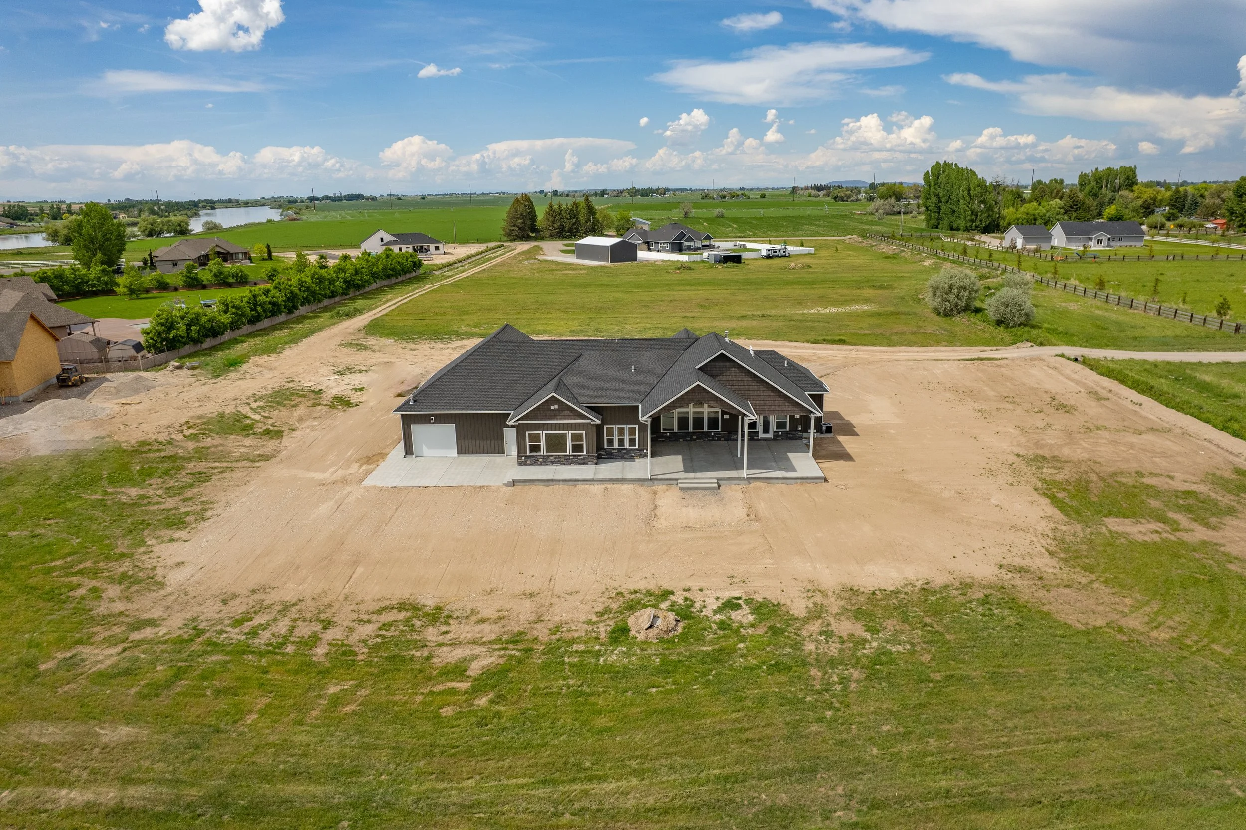 Aerial view of the home and surrounding property — JAB Construction’s Modern Craftsman custom home in Idaho Falls, Idaho.