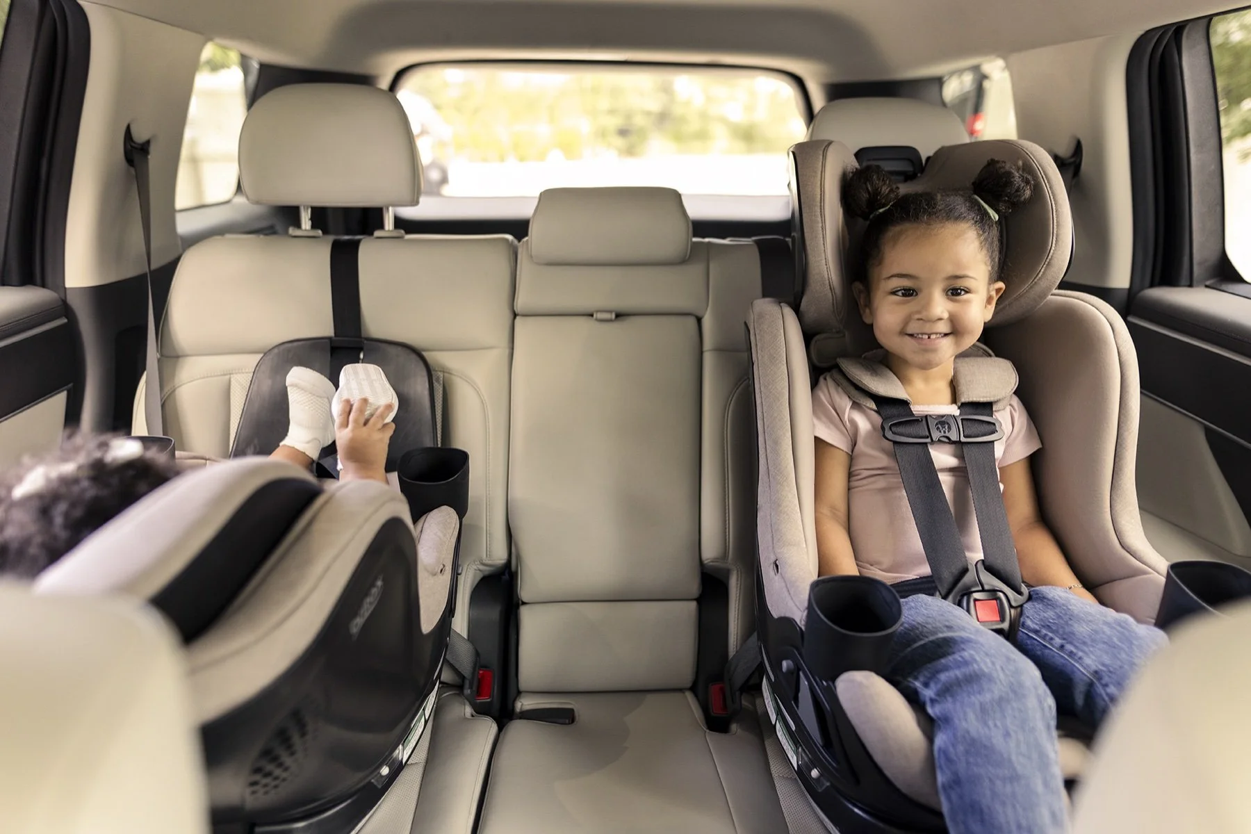 Galaxy360 slim design shown with a family in a vehicle.
