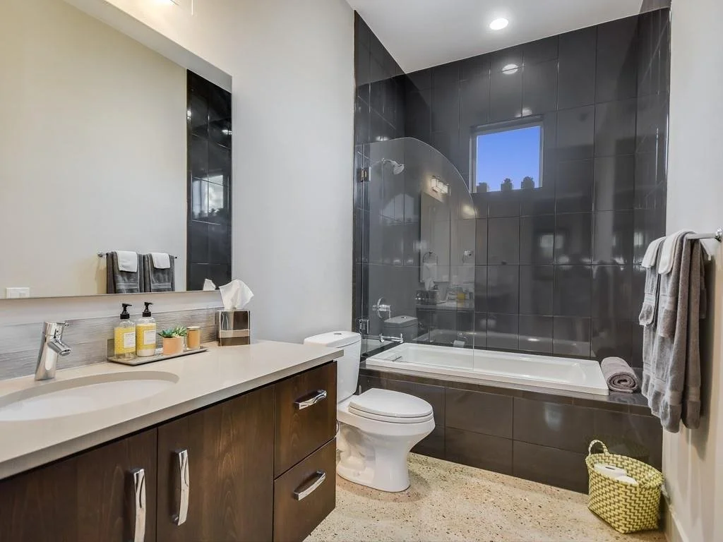serendipity-residence-bathroom-dark-tile.jpg