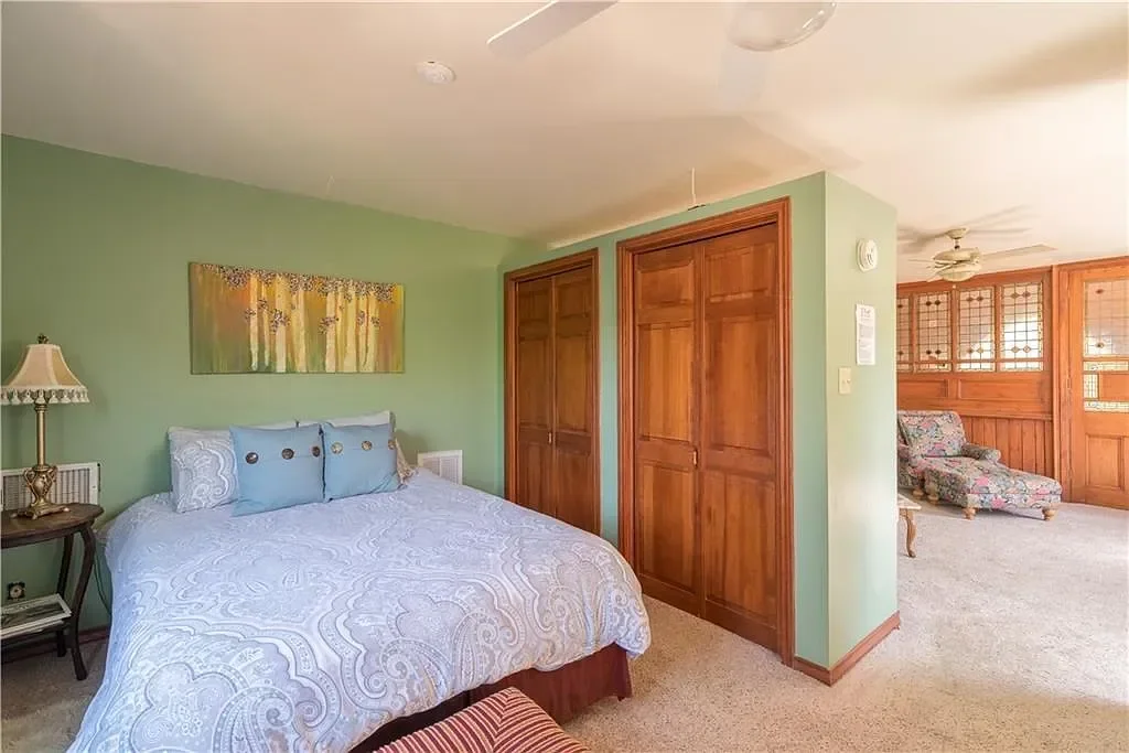austin-texas-hill-country-bedroom-traditional-wood-closets.webp