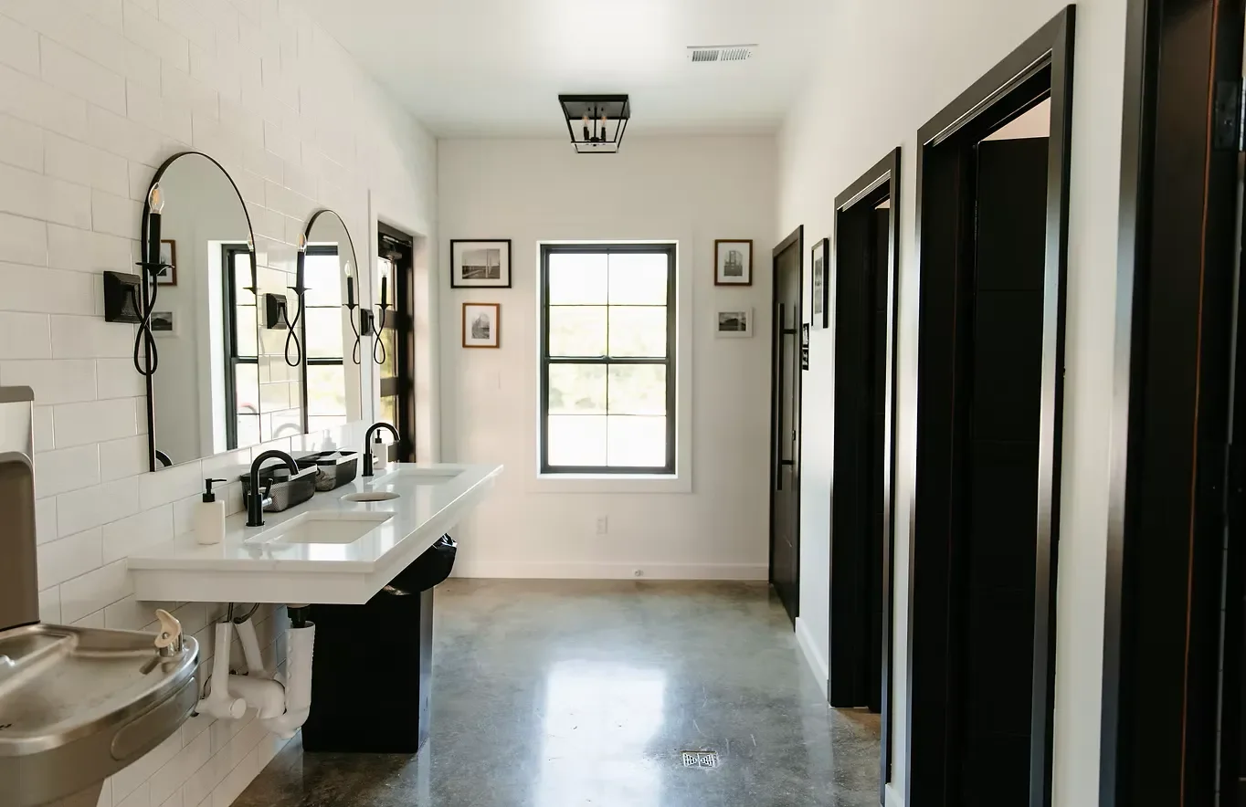 the-brim-kansas-city-restroom-double-sink-minimalist-01.webp