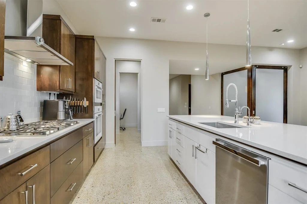serendipity-residence-kitchen-dark-wood-cabinets.jpg