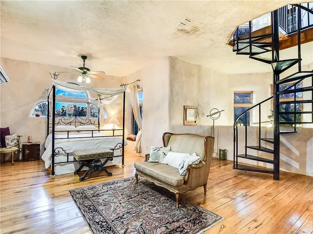 texas-hill-country-luxury-bedroom-spiral-staircase.webp