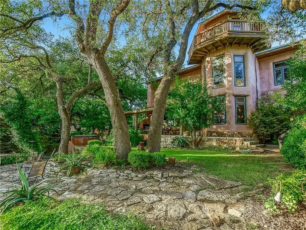 luxury-spicewood-texas-hill-country-home-exterior.webp