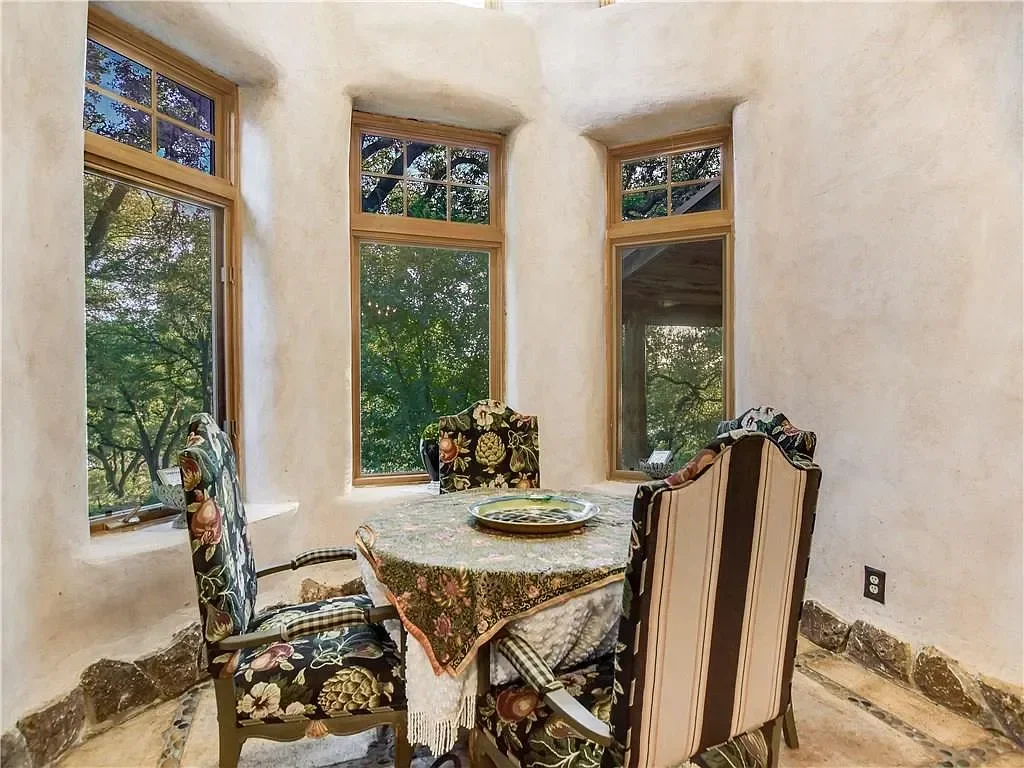texas-hill-country-dining-nook-rustic-windows.webp